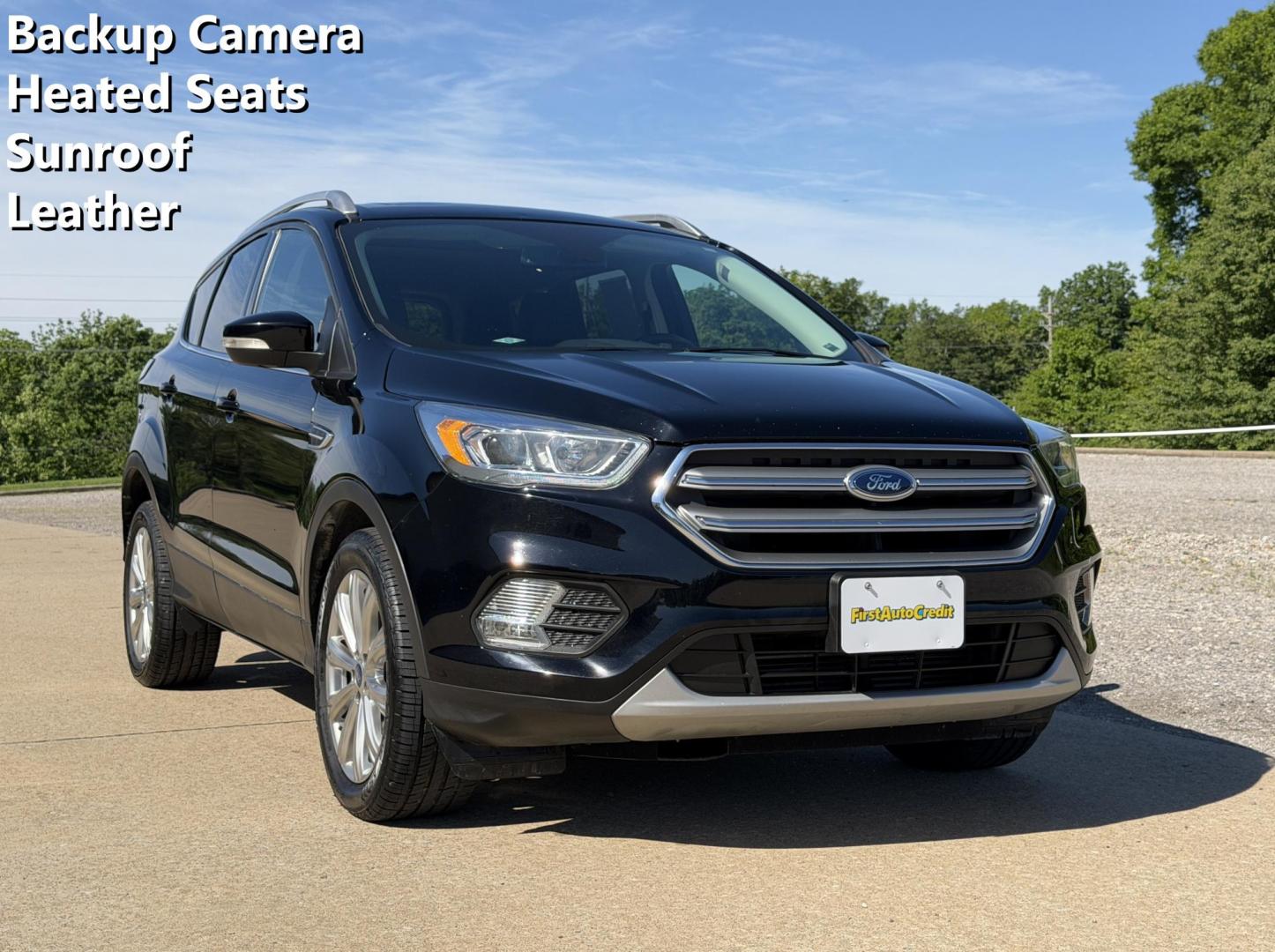 2017 BLACK /Black Ford Escape Titanium 4WD (1FMCU9J91HU) with an 2.0L 4 Cyl. engine, Automatic transmission, located at 2990 Old Orchard Rd., Jackson, MO, 63755, 37.354214, -89.612106 - 2017 Ford Escape Titanium 99xxx miles 4 Wheel Drive 2.0L 4 Cyl. Automatic Leather Backup Camera Power/Heated Seats Sunroof Bluetooth Remote Start Cruise Power Windows/Locks/Mirrors We have financing available and we accept trades! Fill out a credit application on our website or come by - Photo#0