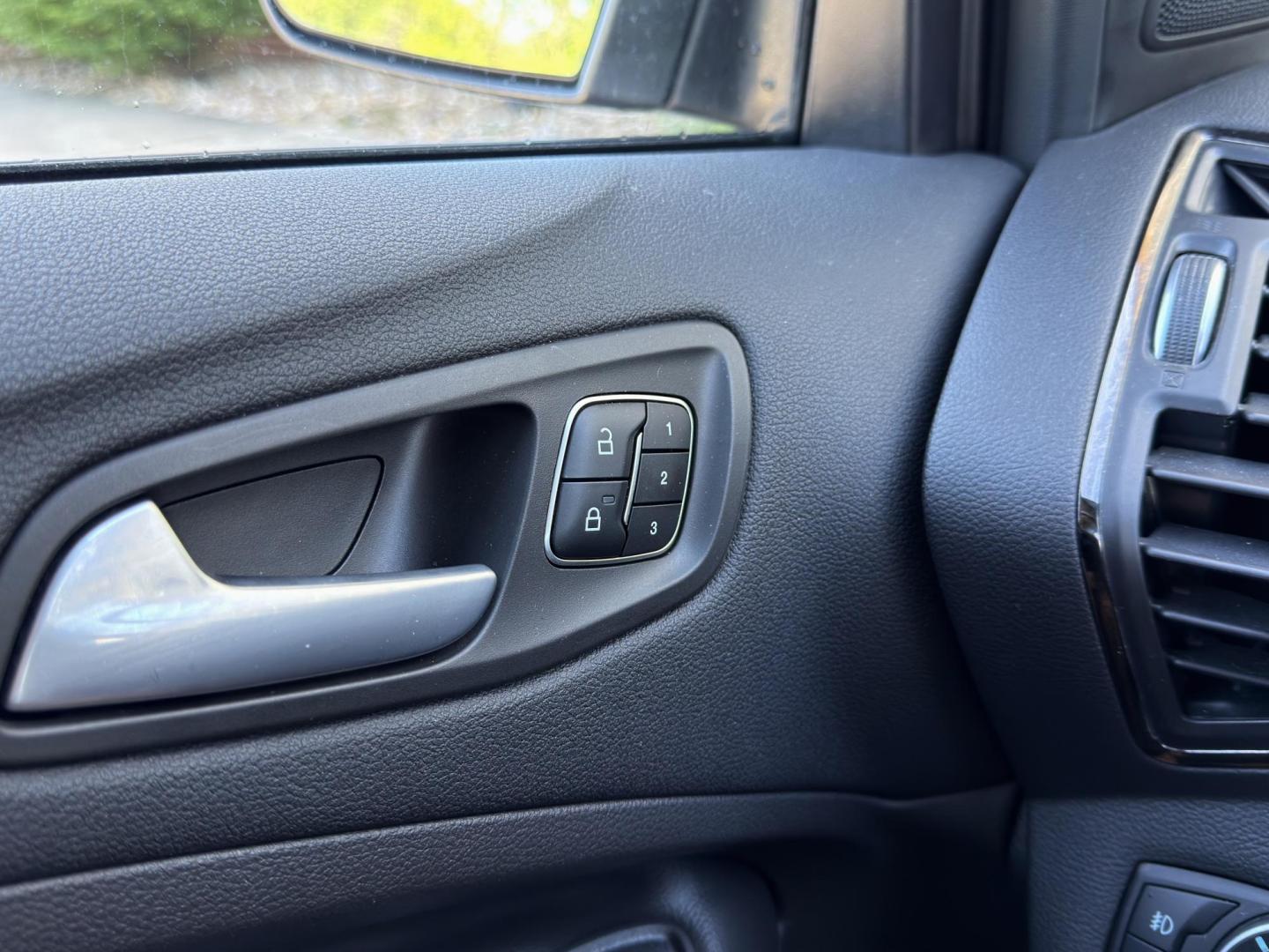 2017 BLACK /Black Ford Escape Titanium 4WD (1FMCU9J91HU) with an 2.0L 4 Cyl. engine, Automatic transmission, located at 2990 Old Orchard Rd., Jackson, MO, 63755, 37.354214, -89.612106 - 2017 Ford Escape Titanium 99xxx miles 4 Wheel Drive 2.0L 4 Cyl. Automatic Leather Backup Camera Power/Heated Seats Sunroof Bluetooth Remote Start Cruise Power Windows/Locks/Mirrors We have financing available and we accept trades! Fill out a credit application on our website or come by - Photo#33