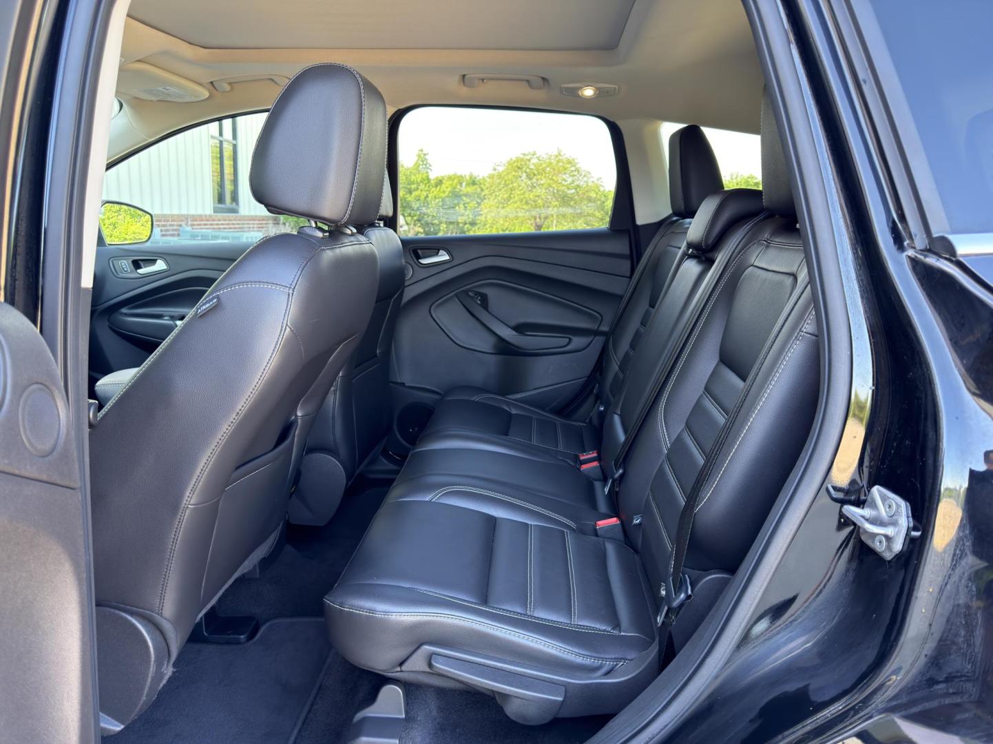 2017 BLACK /Black Ford Escape Titanium 4WD (1FMCU9J91HU) with an 2.0L 4 Cyl. engine, Automatic transmission, located at 2990 Old Orchard Rd., Jackson, MO, 63755, 37.354214, -89.612106 - 2017 Ford Escape Titanium 99xxx miles 4 Wheel Drive 2.0L 4 Cyl. Automatic Leather Backup Camera Power/Heated Seats Sunroof Bluetooth Remote Start Cruise Power Windows/Locks/Mirrors We have financing available and we accept trades! Fill out a credit application on our website or come by - Photo#18