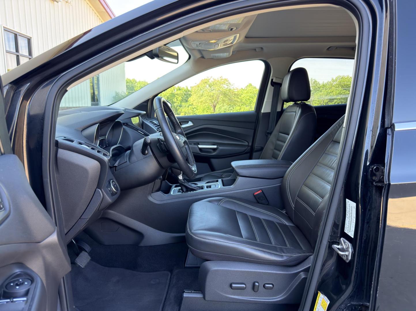 2017 BLACK /Black Ford Escape Titanium 4WD (1FMCU9J91HU) with an 2.0L 4 Cyl. engine, Automatic transmission, located at 2990 Old Orchard Rd., Jackson, MO, 63755, 37.354214, -89.612106 - 2017 Ford Escape Titanium 99xxx miles 4 Wheel Drive 2.0L 4 Cyl. Automatic Leather Backup Camera Power/Heated Seats Sunroof Bluetooth Remote Start Cruise Power Windows/Locks/Mirrors We have financing available and we accept trades! Fill out a credit application on our website or come by - Photo#15