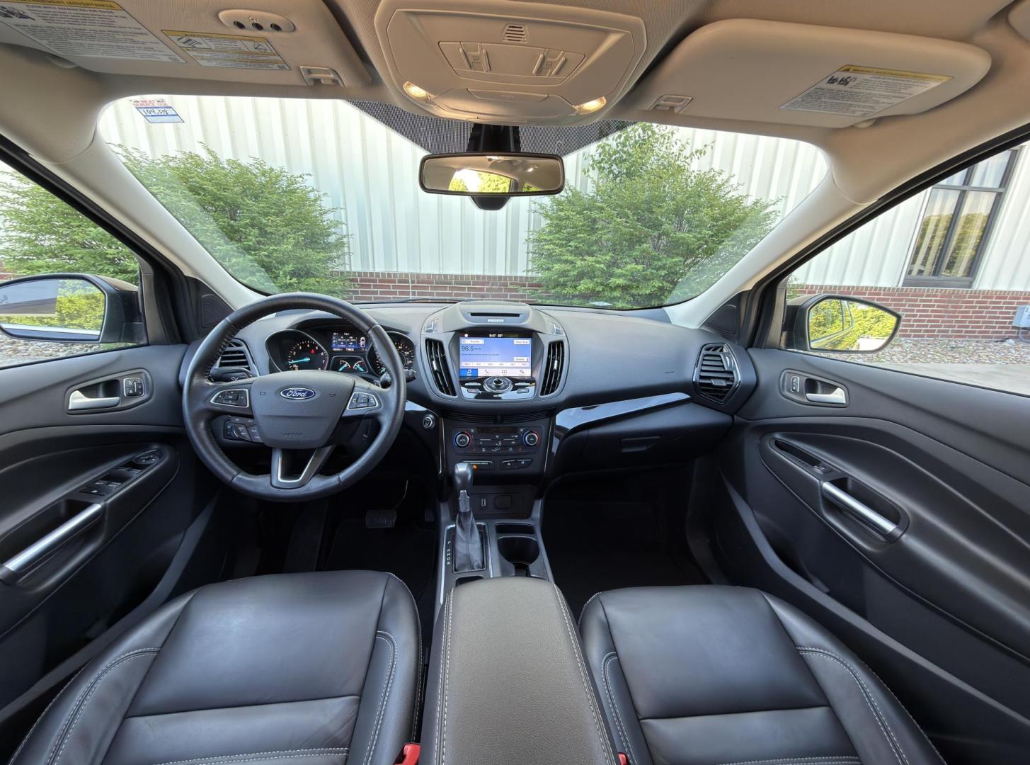 2017 BLACK /Black Ford Escape Titanium 4WD (1FMCU9J91HU) with an 2.0L 4 Cyl. engine, Automatic transmission, located at 2990 Old Orchard Rd., Jackson, MO, 63755, 37.354214, -89.612106 - 2017 Ford Escape Titanium 99xxx miles 4 Wheel Drive 2.0L 4 Cyl. Automatic Leather Backup Camera Power/Heated Seats Sunroof Bluetooth Remote Start Cruise Power Windows/Locks/Mirrors We have financing available and we accept trades! Fill out a credit application on our website or come by - Photo#23