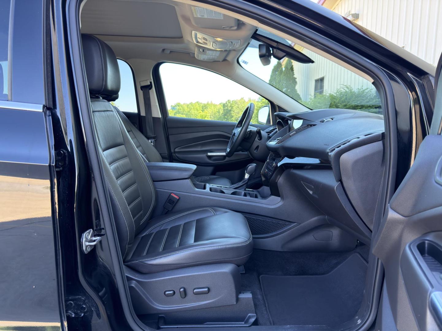 2017 BLACK /Black Ford Escape Titanium 4WD (1FMCU9J91HU) with an 2.0L 4 Cyl. engine, Automatic transmission, located at 2990 Old Orchard Rd., Jackson, MO, 63755, 37.354214, -89.612106 - 2017 Ford Escape Titanium 99xxx miles 4 Wheel Drive 2.0L 4 Cyl. Automatic Leather Backup Camera Power/Heated Seats Sunroof Bluetooth Remote Start Cruise Power Windows/Locks/Mirrors We have financing available and we accept trades! Fill out a credit application on our website or come by - Photo#17