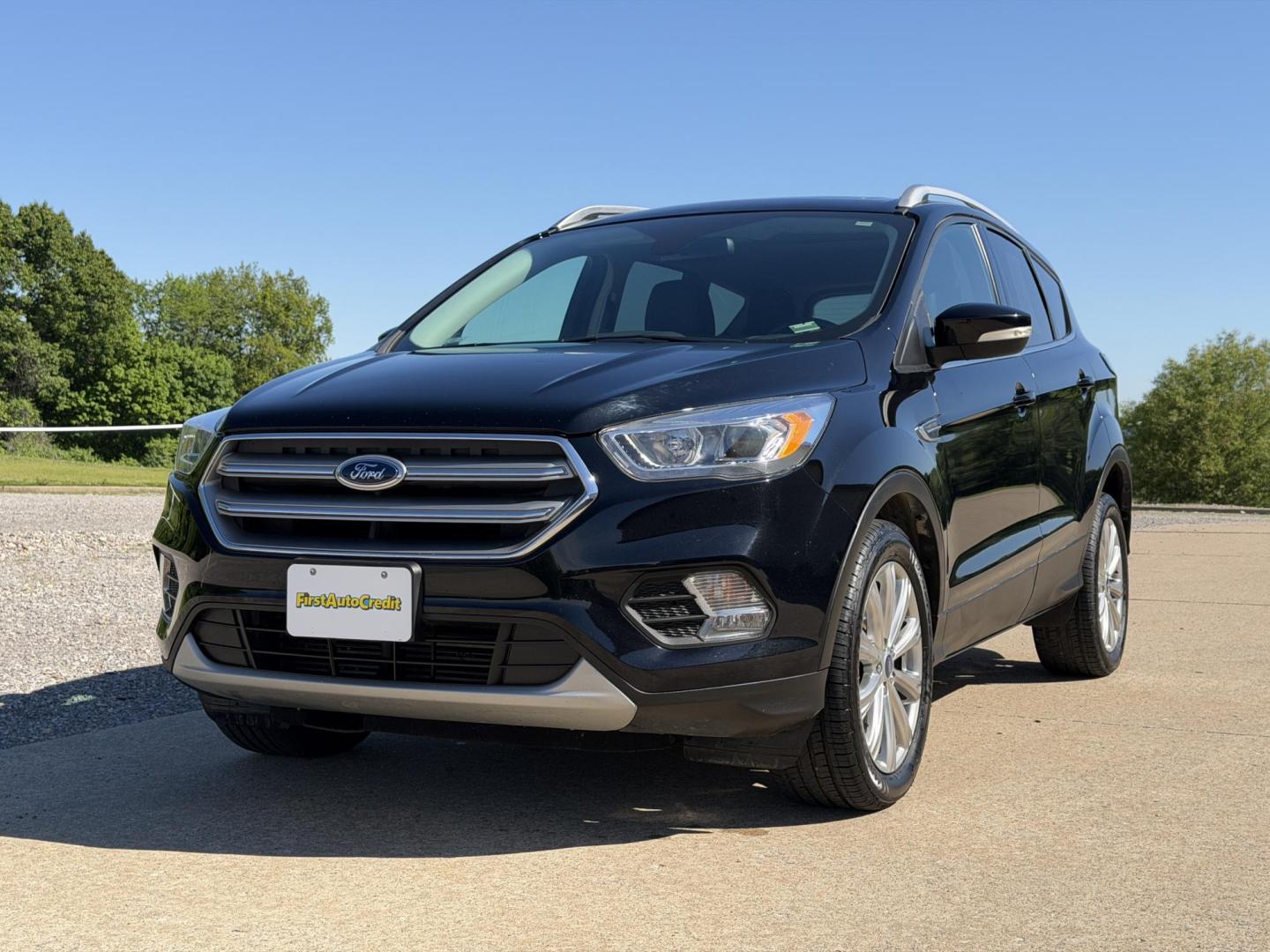 2017 BLACK /Black Ford Escape Titanium 4WD (1FMCU9J91HU) with an 2.0L 4 Cyl. engine, Automatic transmission, located at 2990 Old Orchard Rd., Jackson, MO, 63755, 37.354214, -89.612106 - 2017 Ford Escape Titanium 99xxx miles 4 Wheel Drive 2.0L 4 Cyl. Automatic Leather Backup Camera Power/Heated Seats Sunroof Bluetooth Remote Start Cruise Power Windows/Locks/Mirrors We have financing available and we accept trades! Fill out a credit application on our website or come by - Photo#7