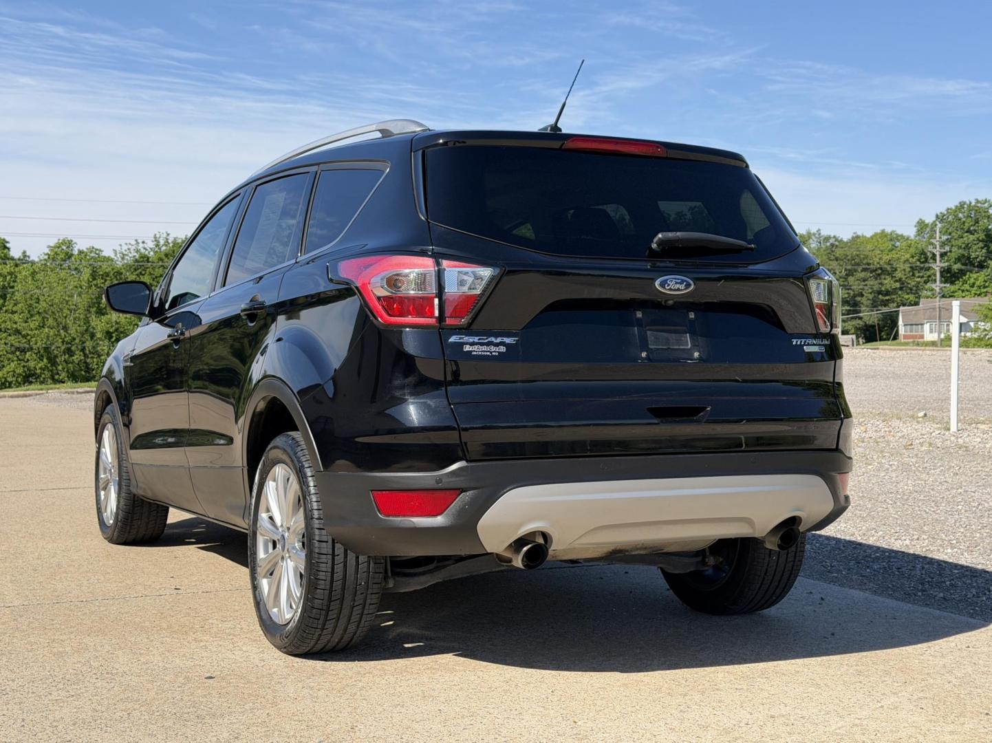 2017 BLACK /Black Ford Escape Titanium 4WD (1FMCU9J91HU) with an 2.0L 4 Cyl. engine, Automatic transmission, located at 2990 Old Orchard Rd., Jackson, MO, 63755, 37.354214, -89.612106 - 2017 Ford Escape Titanium 99xxx miles 4 Wheel Drive 2.0L 4 Cyl. Automatic Leather Backup Camera Power/Heated Seats Sunroof Bluetooth Remote Start Cruise Power Windows/Locks/Mirrors We have financing available and we accept trades! Fill out a credit application on our website or come by - Photo#11