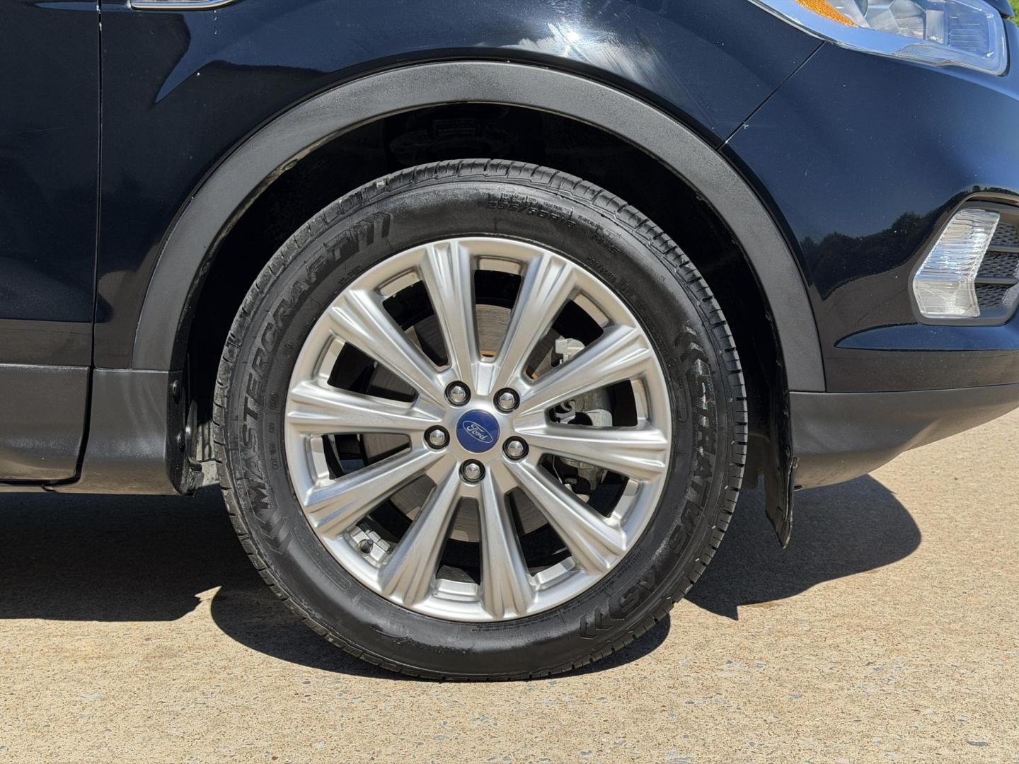 2017 BLACK /Black Ford Escape Titanium 4WD (1FMCU9J91HU) with an 2.0L 4 Cyl. engine, Automatic transmission, located at 2990 Old Orchard Rd., Jackson, MO, 63755, 37.354214, -89.612106 - 2017 Ford Escape Titanium 99xxx miles 4 Wheel Drive 2.0L 4 Cyl. Automatic Leather Backup Camera Power/Heated Seats Sunroof Bluetooth Remote Start Cruise Power Windows/Locks/Mirrors We have financing available and we accept trades! Fill out a credit application on our website or come by - Photo#45