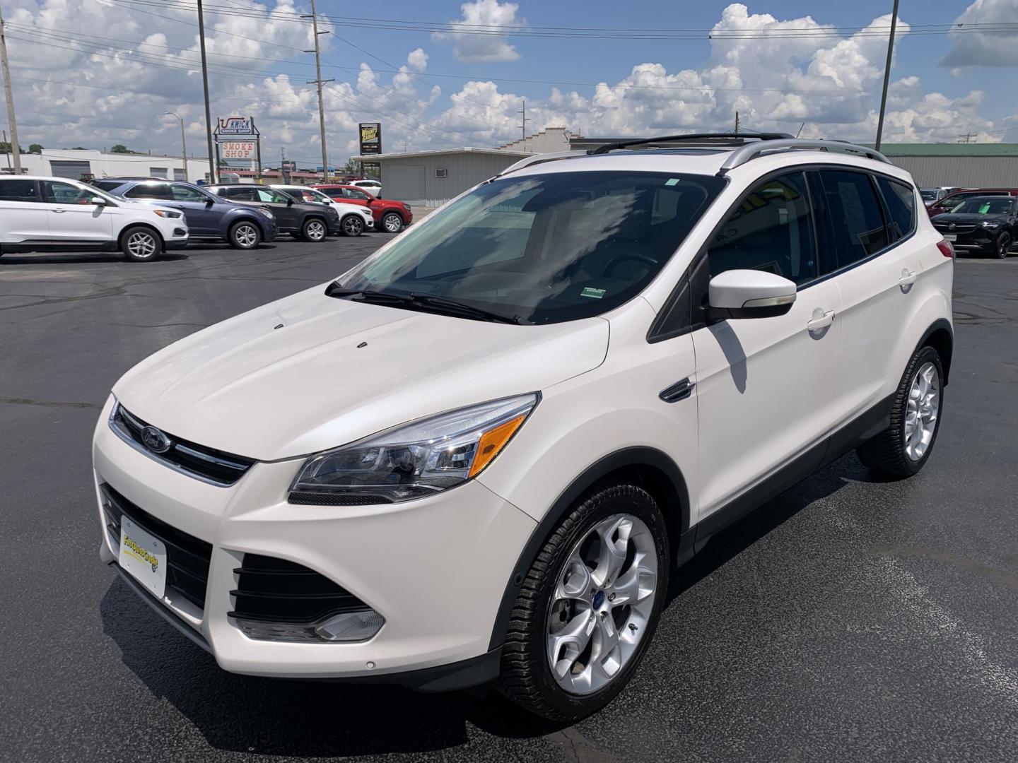 2014 WHITE /TAN Ford Escape Titanium 4WD (1FMCU9J92EU) with an 2.0L L4 DOHC 16V engine, Automatic transmission, located at 506 S. Kingshighway, Cape Girardeau, MO, 63703, (573) 235-5000, 37.294991, -89.553635 - 2014 Ford Escape Titanium 4WD 115,xxx miles Heated Seats Power Seat Sunroof 4WD Backup Cam Leather Keyless Entry Remote Start Power Windows/Locks/Mirrors We have financing available and we accept trades! Fill out a credit application on our website or come by today! If you have any q - Photo#3