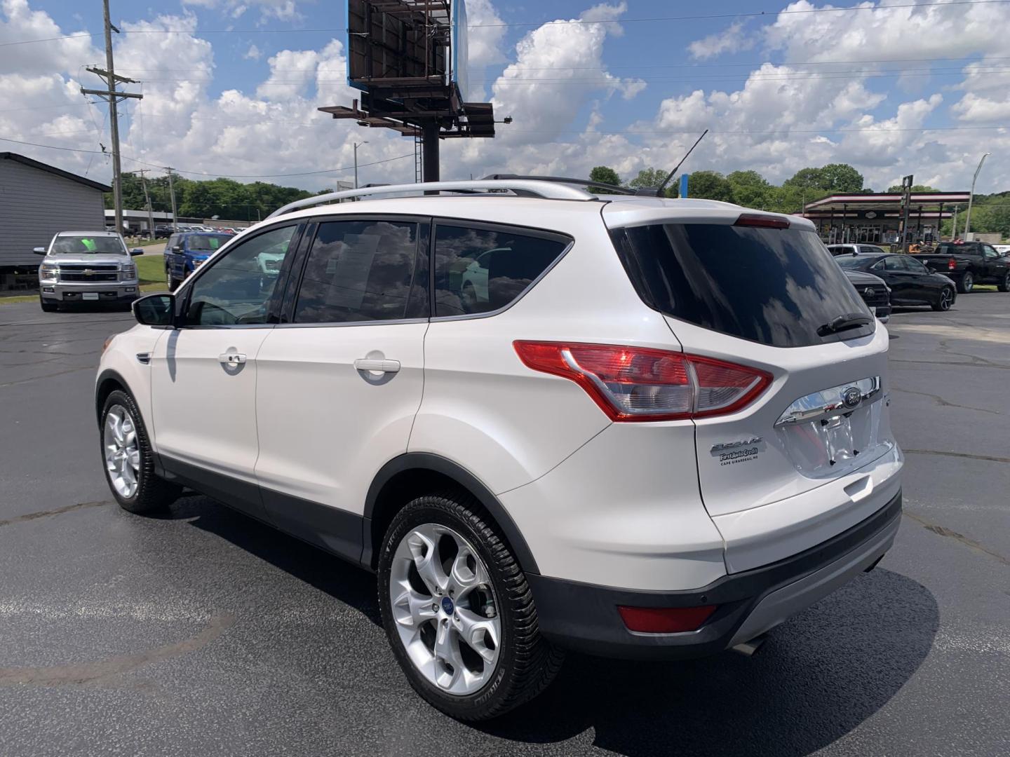 2014 WHITE /TAN Ford Escape Titanium 4WD (1FMCU9J92EU) with an 2.0L L4 DOHC 16V engine, Automatic transmission, located at 506 S. Kingshighway, Cape Girardeau, MO, 63703, (573) 235-5000, 37.294991, -89.553635 - 2014 Ford Escape Titanium 4WD 115,xxx miles Heated Seats Power Seat Sunroof 4WD Backup Cam Leather Keyless Entry Remote Start Power Windows/Locks/Mirrors We have financing available and we accept trades! Fill out a credit application on our website or come by today! If you have any q - Photo#5