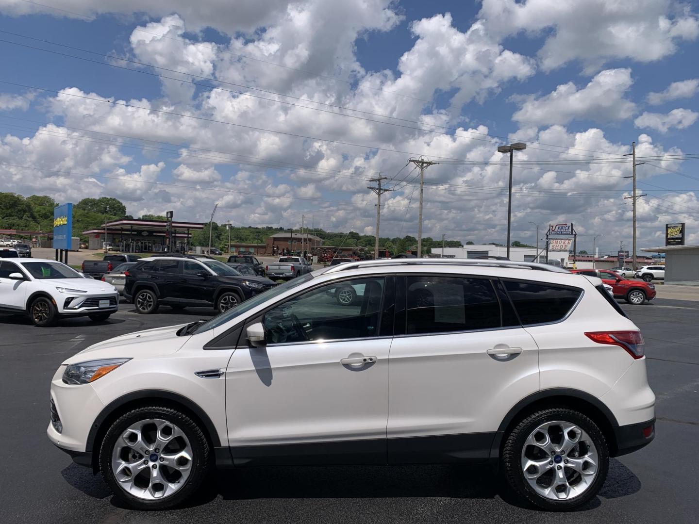 2014 WHITE /TAN Ford Escape Titanium 4WD (1FMCU9J92EU) with an 2.0L L4 DOHC 16V engine, Automatic transmission, located at 506 S. Kingshighway, Cape Girardeau, MO, 63703, (573) 235-5000, 37.294991, -89.553635 - 2014 Ford Escape Titanium 4WD 115,xxx miles Heated Seats Power Seat Sunroof 4WD Backup Cam Leather Keyless Entry Remote Start Power Windows/Locks/Mirrors We have financing available and we accept trades! Fill out a credit application on our website or come by today! If you have any q - Photo#4
