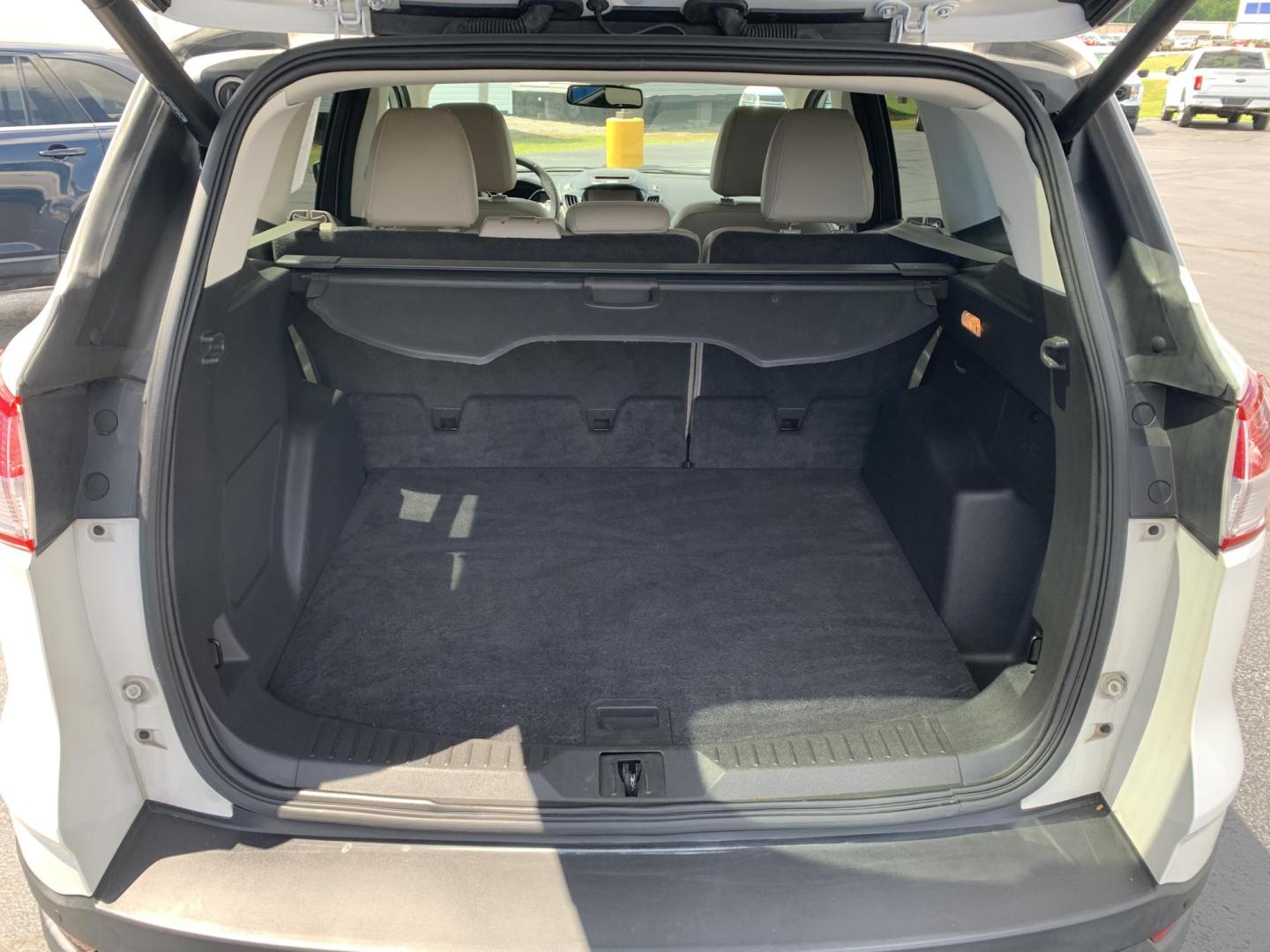 2014 WHITE /TAN Ford Escape Titanium 4WD (1FMCU9J92EU) with an 2.0L L4 DOHC 16V engine, Automatic transmission, located at 506 S. Kingshighway, Cape Girardeau, MO, 63703, (573) 235-5000, 37.294991, -89.553635 - 2014 Ford Escape Titanium 4WD 115,xxx miles Heated Seats Power Seat Sunroof 4WD Backup Cam Leather Keyless Entry Remote Start Power Windows/Locks/Mirrors We have financing available and we accept trades! Fill out a credit application on our website or come by today! If you have any q - Photo#7