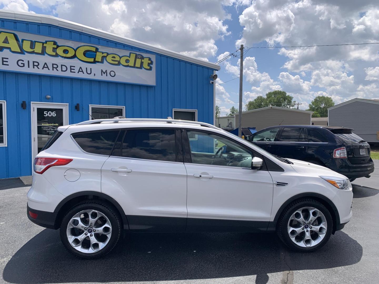 2014 WHITE /TAN Ford Escape Titanium 4WD (1FMCU9J92EU) with an 2.0L L4 DOHC 16V engine, Automatic transmission, located at 506 S. Kingshighway, Cape Girardeau, MO, 63703, (573) 235-5000, 37.294991, -89.553635 - 2014 Ford Escape Titanium 4WD 115,xxx miles Heated Seats Power Seat Sunroof 4WD Backup Cam Leather Keyless Entry Remote Start Power Windows/Locks/Mirrors We have financing available and we accept trades! Fill out a credit application on our website or come by today! If you have any q - Photo#10