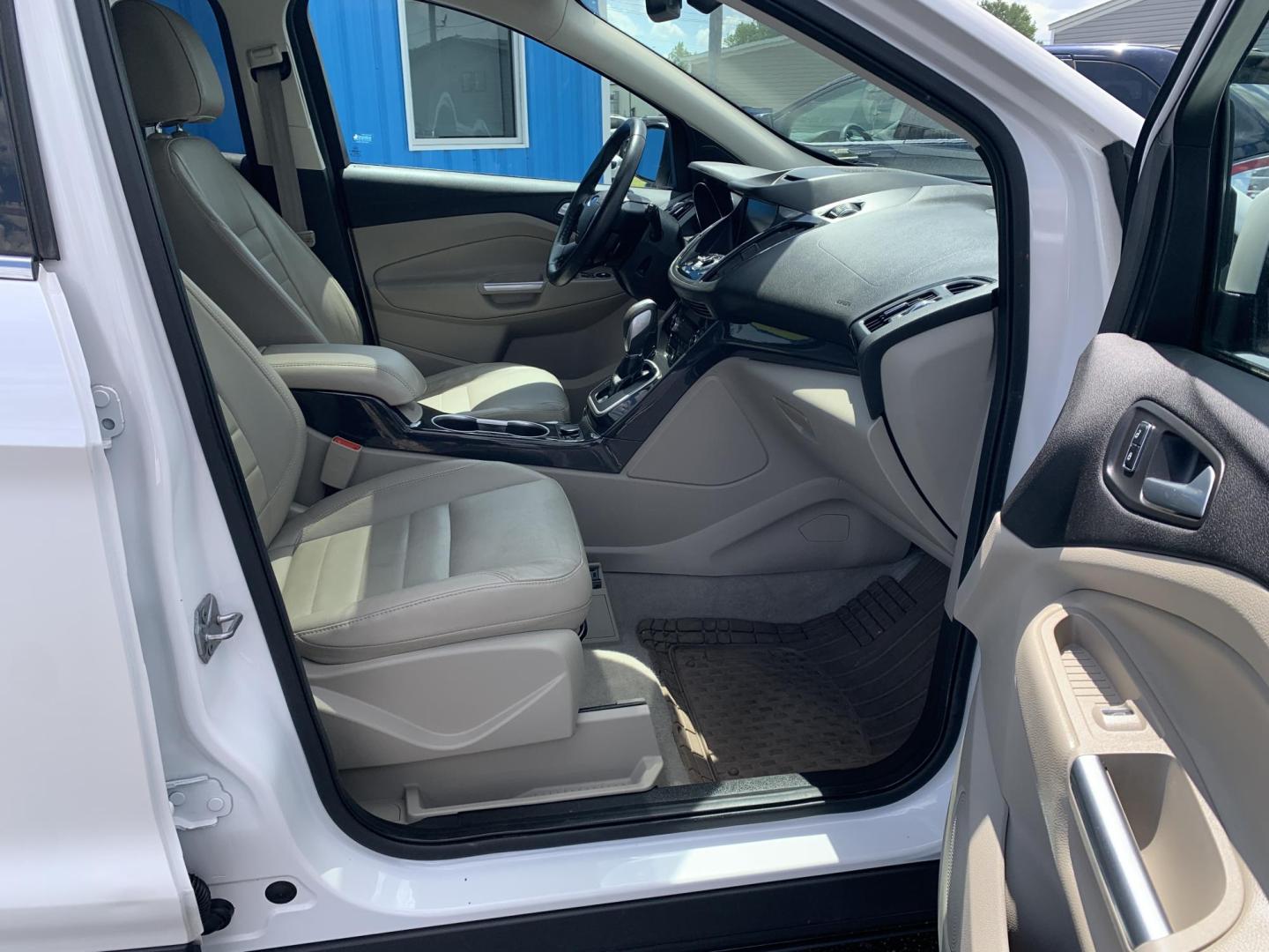 2014 WHITE /TAN Ford Escape Titanium 4WD (1FMCU9J92EU) with an 2.0L L4 DOHC 16V engine, Automatic transmission, located at 506 S. Kingshighway, Cape Girardeau, MO, 63703, (573) 235-5000, 37.294991, -89.553635 - 2014 Ford Escape Titanium 4WD 115,xxx miles Heated Seats Power Seat Sunroof 4WD Backup Cam Leather Keyless Entry Remote Start Power Windows/Locks/Mirrors We have financing available and we accept trades! Fill out a credit application on our website or come by today! If you have any q - Photo#12