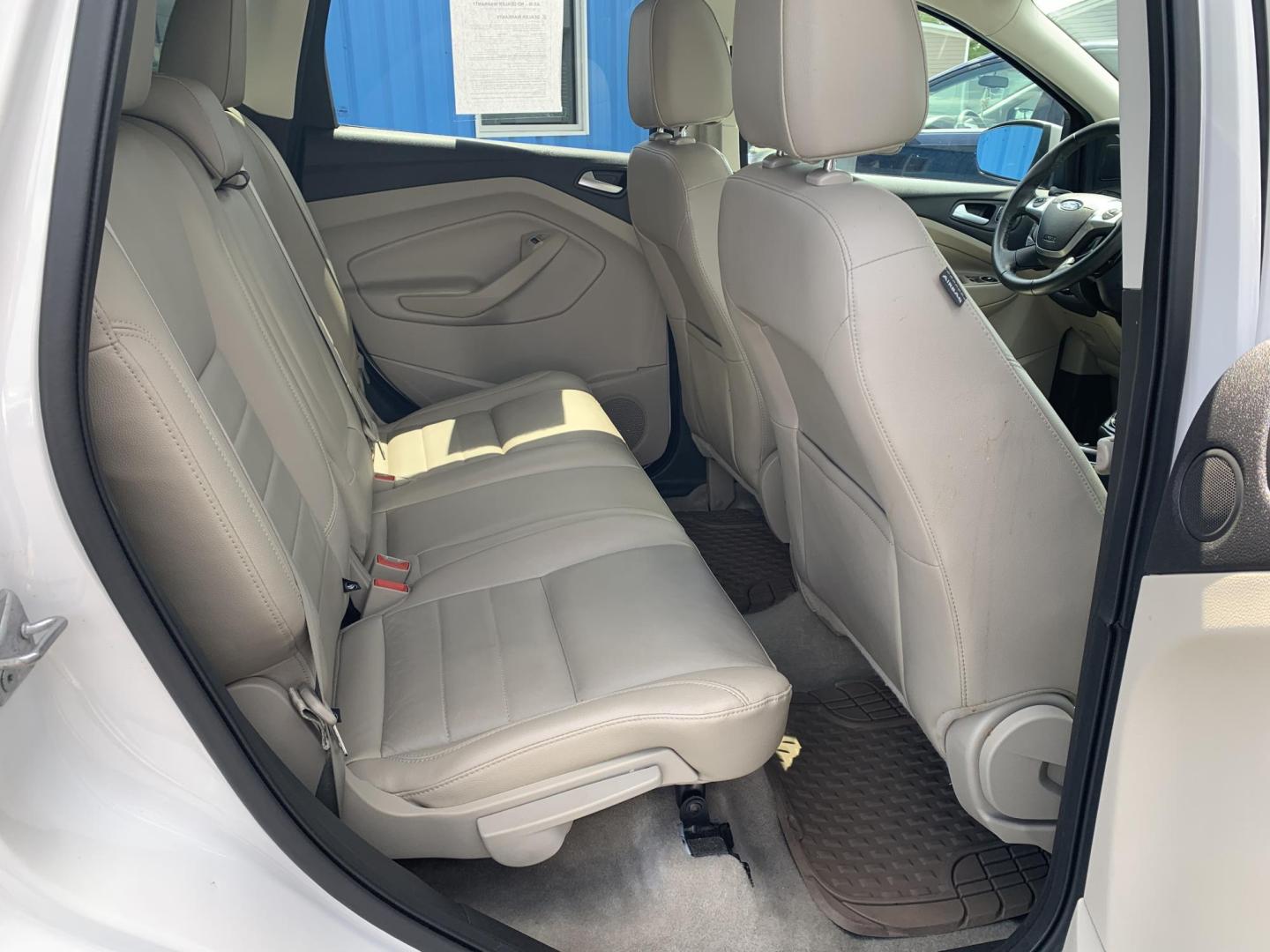 2014 WHITE /TAN Ford Escape Titanium 4WD (1FMCU9J92EU) with an 2.0L L4 DOHC 16V engine, Automatic transmission, located at 506 S. Kingshighway, Cape Girardeau, MO, 63703, (573) 235-5000, 37.294991, -89.553635 - 2014 Ford Escape Titanium 4WD 115,xxx miles Heated Seats Power Seat Sunroof 4WD Backup Cam Leather Keyless Entry Remote Start Power Windows/Locks/Mirrors We have financing available and we accept trades! Fill out a credit application on our website or come by today! If you have any q - Photo#14