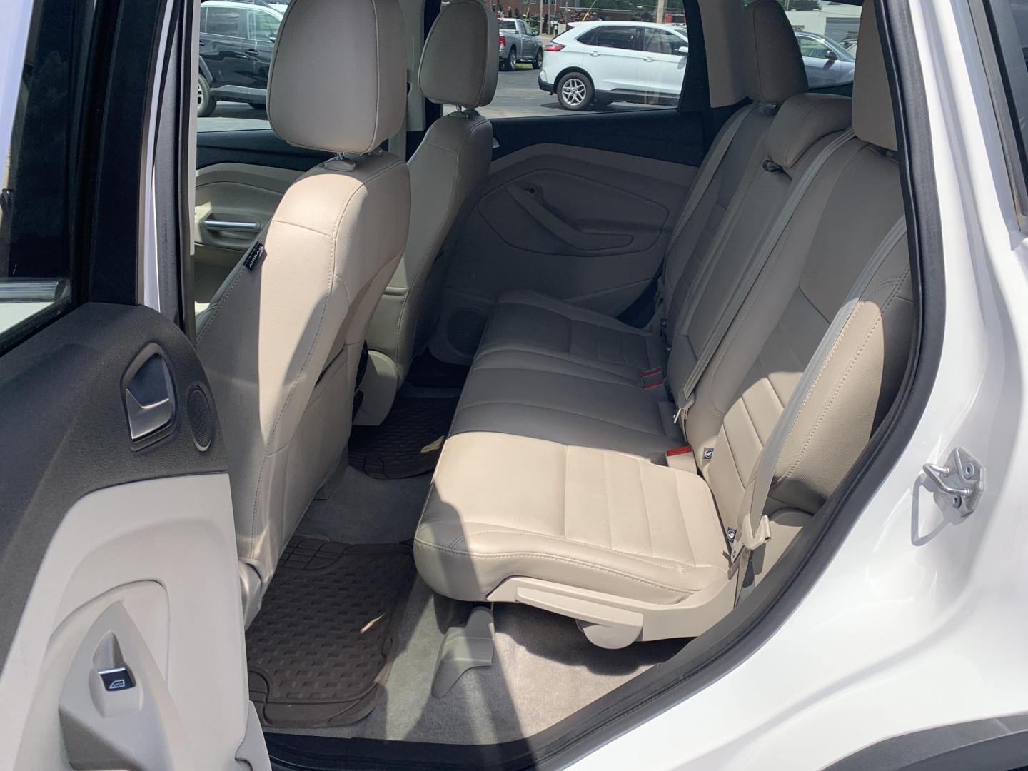 2014 WHITE /TAN Ford Escape Titanium 4WD (1FMCU9J92EU) with an 2.0L L4 DOHC 16V engine, Automatic transmission, located at 506 S. Kingshighway, Cape Girardeau, MO, 63703, (573) 235-5000, 37.294991, -89.553635 - 2014 Ford Escape Titanium 4WD 115,xxx miles Heated Seats Power Seat Sunroof 4WD Backup Cam Leather Keyless Entry Remote Start Power Windows/Locks/Mirrors We have financing available and we accept trades! Fill out a credit application on our website or come by today! If you have any q - Photo#17