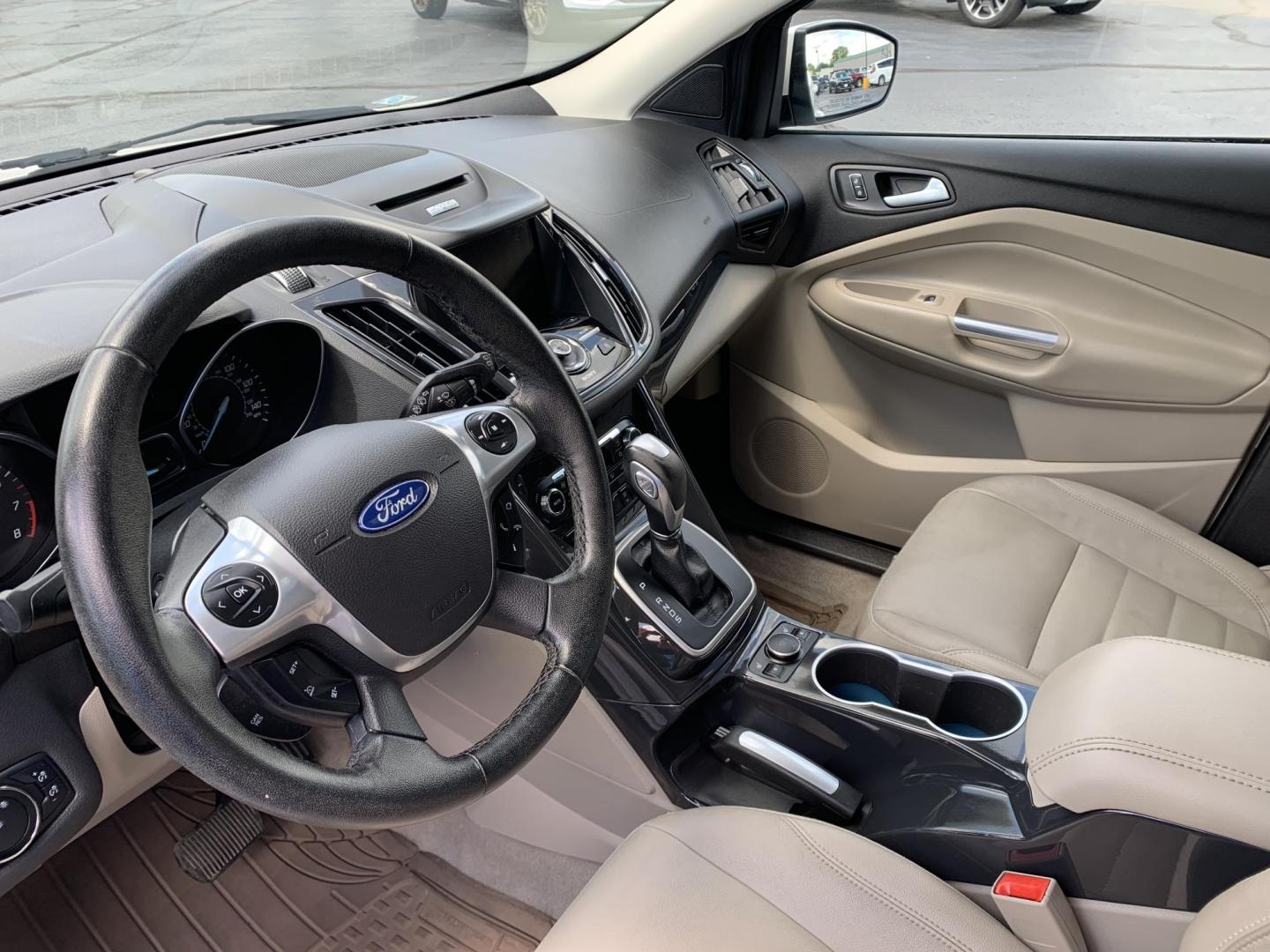 2014 WHITE /TAN Ford Escape Titanium 4WD (1FMCU9J92EU) with an 2.0L L4 DOHC 16V engine, Automatic transmission, located at 506 S. Kingshighway, Cape Girardeau, MO, 63703, (573) 235-5000, 37.294991, -89.553635 - 2014 Ford Escape Titanium 4WD 115,xxx miles Heated Seats Power Seat Sunroof 4WD Backup Cam Leather Keyless Entry Remote Start Power Windows/Locks/Mirrors We have financing available and we accept trades! Fill out a credit application on our website or come by today! If you have any q - Photo#24