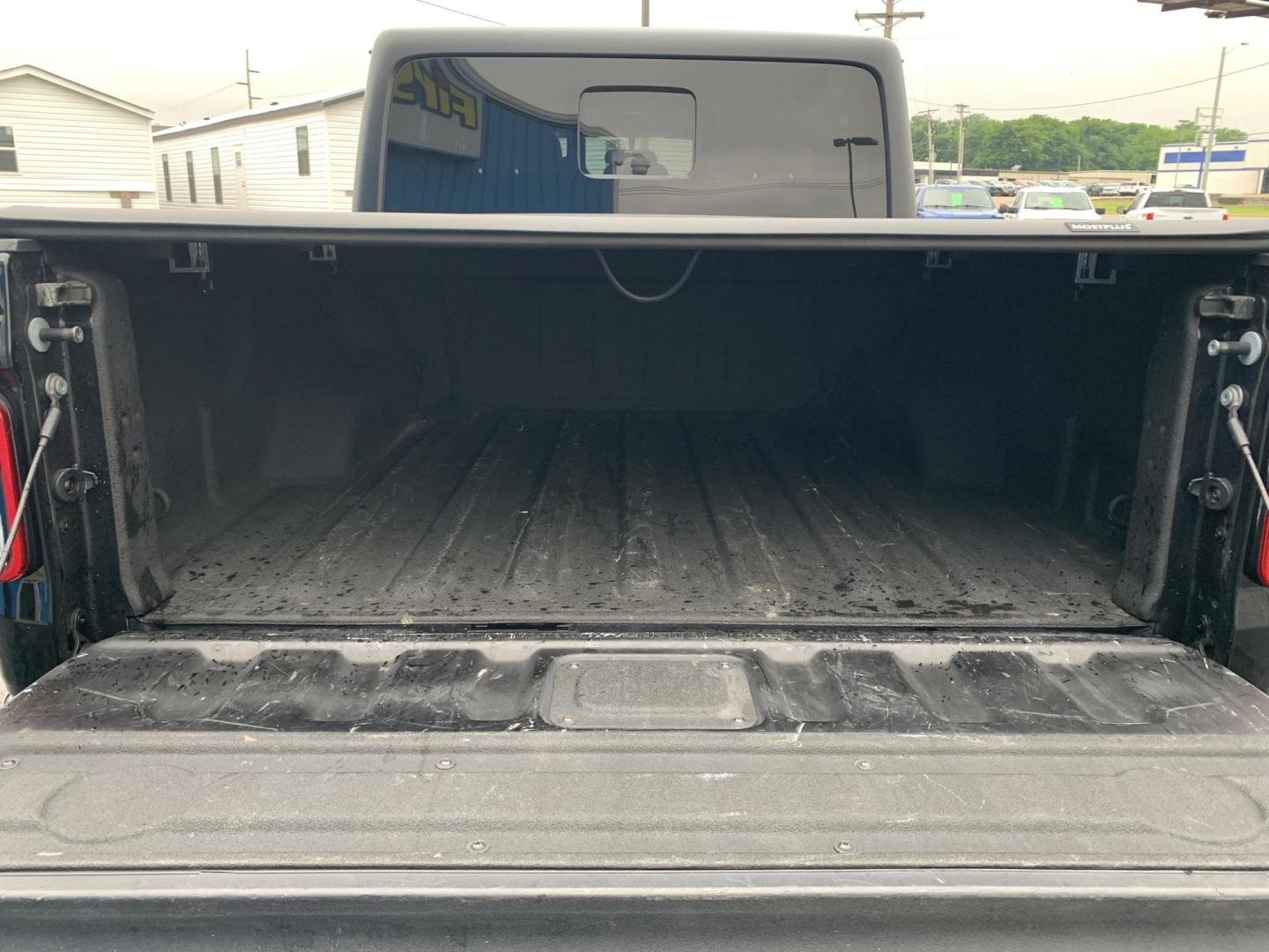 2023 BLACK /BLACK Jeep Gladiator Sport (1C6HJTAG5PL) with an 3.6L V6 DOHC 24V engine, Automatic transmission, located at 506 S. Kingshighway, Cape Girardeau, MO, 63703, (573) 235-5000, 37.294991, -89.553635 - 2023 Jeep Gladiator Sport 63,xxx miles Power Windows Removable Hardtop Cruise Bluetooth Power Mirros Backup Cam Keyless Entry Remote Start We have financing available and we accept trades! Fill out a credit application on our website or come by today! If you have any questions, give us - Photo#7