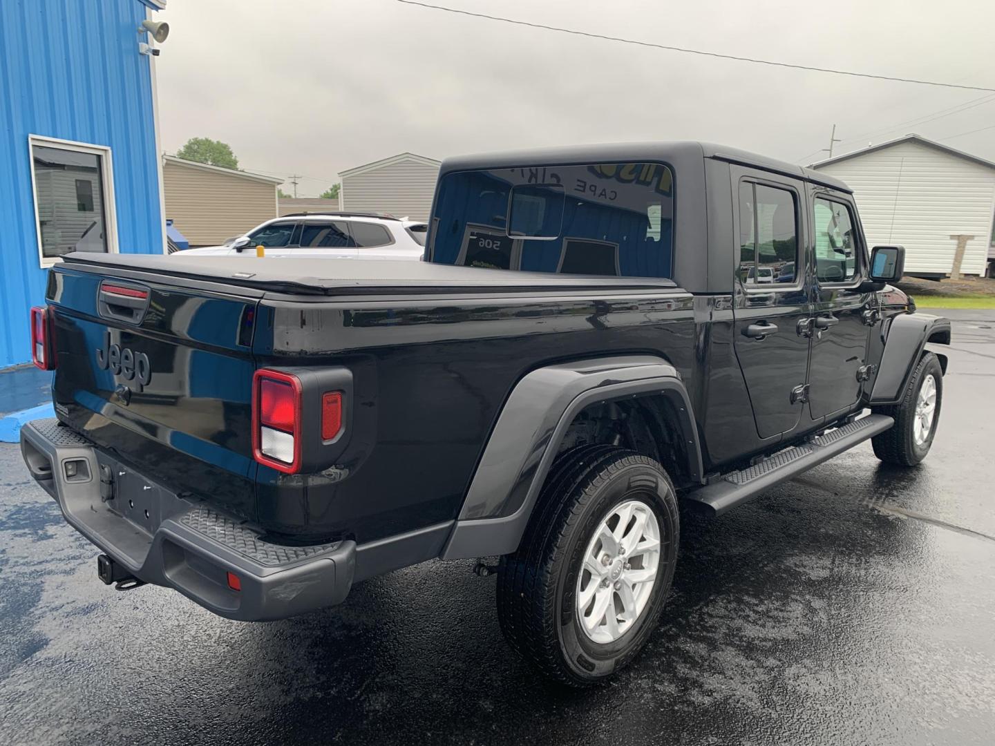 2023 BLACK /BLACK Jeep Gladiator Sport (1C6HJTAG5PL) with an 3.6L V6 DOHC 24V engine, Automatic transmission, located at 506 S. Kingshighway, Cape Girardeau, MO, 63703, (573) 235-5000, 37.294991, -89.553635 - 2023 Jeep Gladiator Sport 63,xxx miles Power Windows Removable Hardtop Cruise Bluetooth Power Mirros Backup Cam Keyless Entry Remote Start We have financing available and we accept trades! Fill out a credit application on our website or come by today! If you have any questions, give us - Photo#8