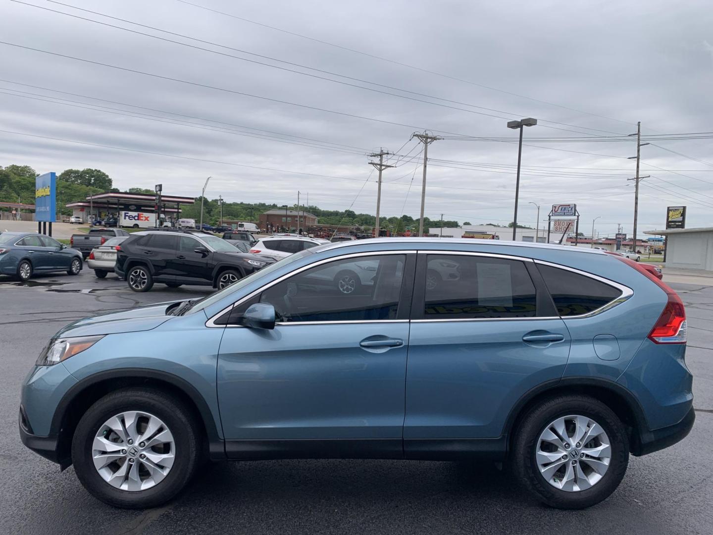 2014 GREEN /TAN Honda CR-V EX-L 4WD (2HKRM4H75EH) with an 2.4L L4 DOHC 16V engine, 5-Speed Automatic transmission, located at 506 S. Kingshighway, Cape Girardeau, MO, 63703, (573) 235-5000, 37.294991, -89.553635 - 2014 Honda CR-V EX-L AWD 76,xxx miles Heated Seats Sunroof Power Seat All Wheel Drive Keyless Entry Power Windows/Locks/Mirrors We have financing available and we accept trades! Fill out a credit application on our website or come by today! If you have any questions, give us a call at (57 - Photo#3