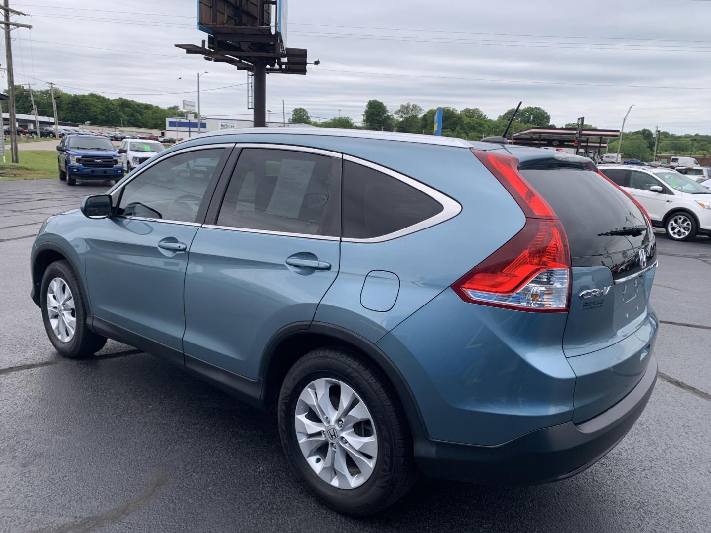 2014 GREEN /TAN Honda CR-V EX-L 4WD (2HKRM4H75EH) with an 2.4L L4 DOHC 16V engine, 5-Speed Automatic transmission, located at 506 S. Kingshighway, Cape Girardeau, MO, 63703, (573) 235-5000, 37.294991, -89.553635 - 2014 Honda CR-V EX-L AWD 76,xxx miles Heated Seats Sunroof Power Seat All Wheel Drive Keyless Entry Power Windows/Locks/Mirrors We have financing available and we accept trades! Fill out a credit application on our website or come by today! If you have any questions, give us a call at (57 - Photo#4