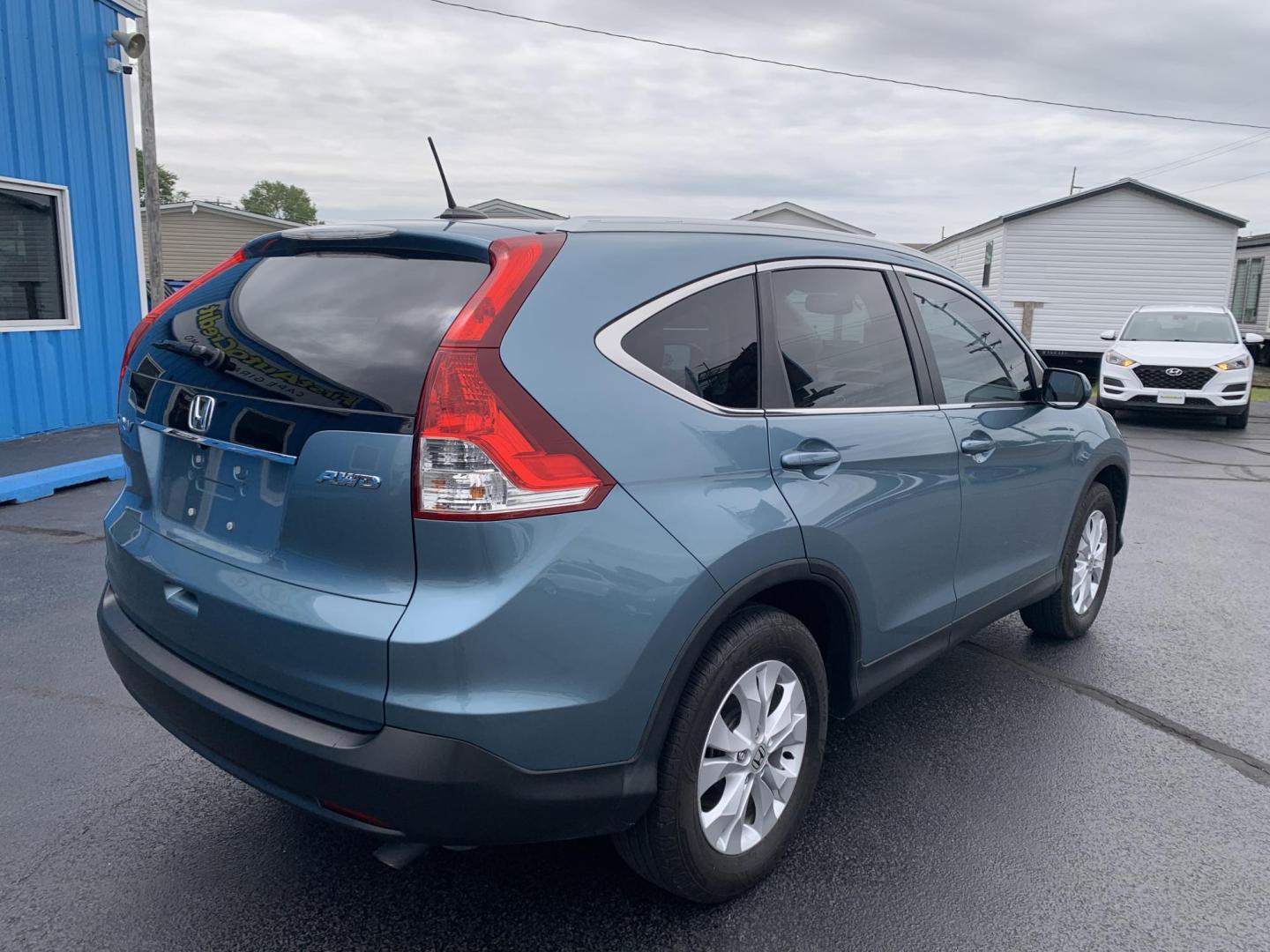 2014 GREEN /TAN Honda CR-V EX-L 4WD (2HKRM4H75EH) with an 2.4L L4 DOHC 16V engine, 5-Speed Automatic transmission, located at 506 S. Kingshighway, Cape Girardeau, MO, 63703, (573) 235-5000, 37.294991, -89.553635 - 2014 Honda CR-V EX-L AWD 76,xxx miles Heated Seats Sunroof Power Seat All Wheel Drive Keyless Entry Power Windows/Locks/Mirrors We have financing available and we accept trades! Fill out a credit application on our website or come by today! If you have any questions, give us a call at (57 - Photo#8