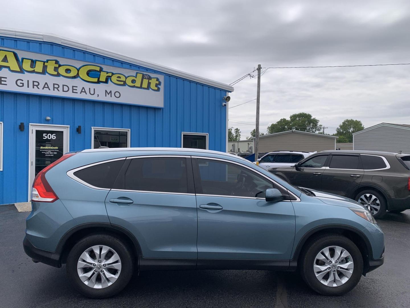 2014 GREEN /TAN Honda CR-V EX-L 4WD (2HKRM4H75EH) with an 2.4L L4 DOHC 16V engine, 5-Speed Automatic transmission, located at 506 S. Kingshighway, Cape Girardeau, MO, 63703, (573) 235-5000, 37.294991, -89.553635 - 2014 Honda CR-V EX-L AWD 76,xxx miles Heated Seats Sunroof Power Seat All Wheel Drive Keyless Entry Power Windows/Locks/Mirrors We have financing available and we accept trades! Fill out a credit application on our website or come by today! If you have any questions, give us a call at (57 - Photo#7