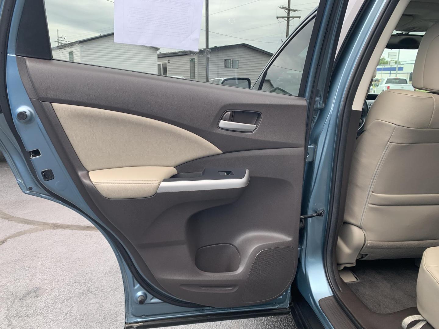 2014 GREEN /TAN Honda CR-V EX-L 4WD (2HKRM4H75EH) with an 2.4L L4 DOHC 16V engine, 5-Speed Automatic transmission, located at 506 S. Kingshighway, Cape Girardeau, MO, 63703, (573) 235-5000, 37.294991, -89.553635 - 2014 Honda CR-V EX-L AWD 76,xxx miles Heated Seats Sunroof Power Seat All Wheel Drive Keyless Entry Power Windows/Locks/Mirrors We have financing available and we accept trades! Fill out a credit application on our website or come by today! If you have any questions, give us a call at (57 - Photo#14