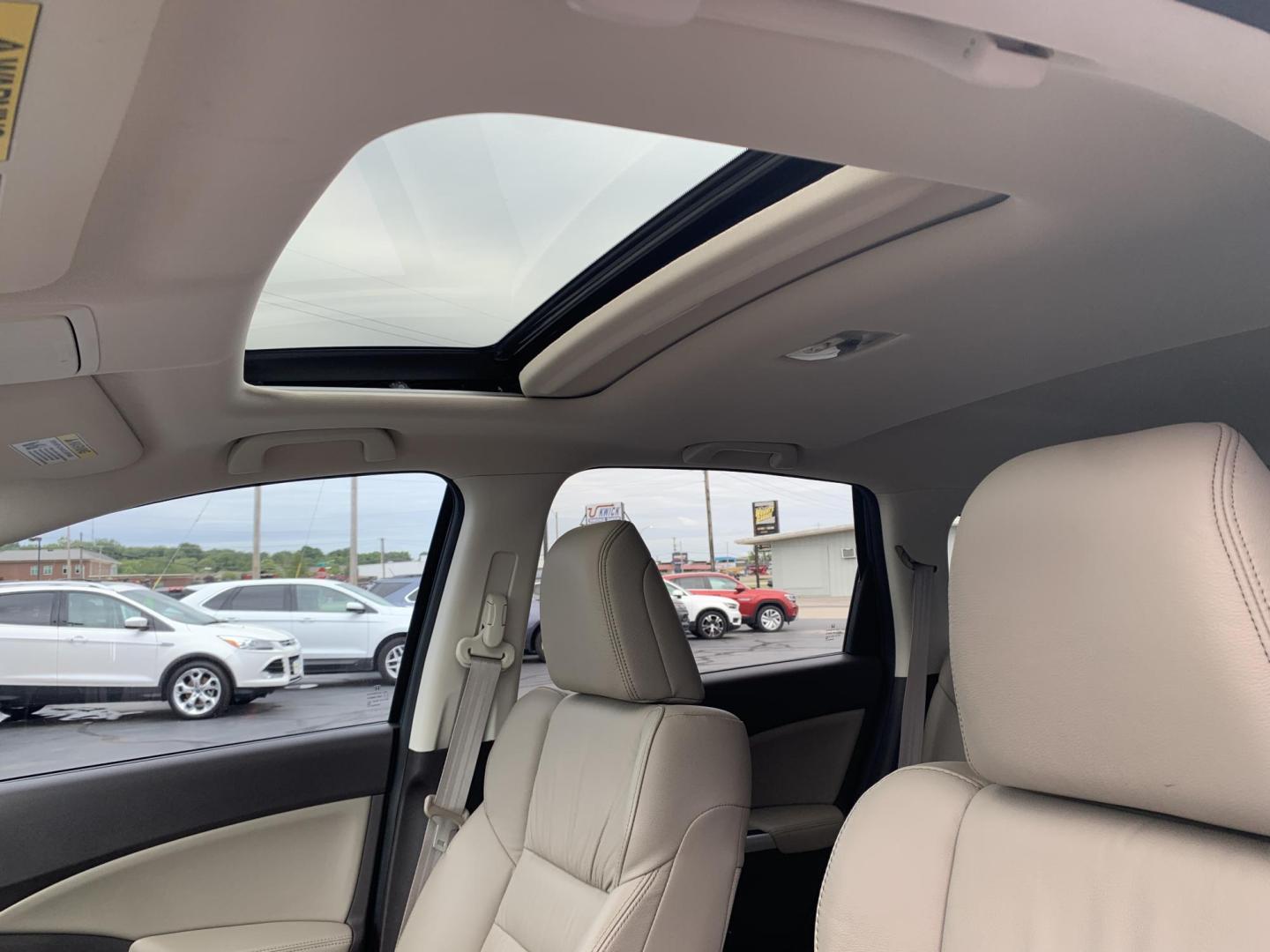 2014 GREEN /TAN Honda CR-V EX-L 4WD (2HKRM4H75EH) with an 2.4L L4 DOHC 16V engine, 5-Speed Automatic transmission, located at 506 S. Kingshighway, Cape Girardeau, MO, 63703, (573) 235-5000, 37.294991, -89.553635 - 2014 Honda CR-V EX-L AWD 76,xxx miles Heated Seats Sunroof Power Seat All Wheel Drive Keyless Entry Power Windows/Locks/Mirrors We have financing available and we accept trades! Fill out a credit application on our website or come by today! If you have any questions, give us a call at (57 - Photo#31