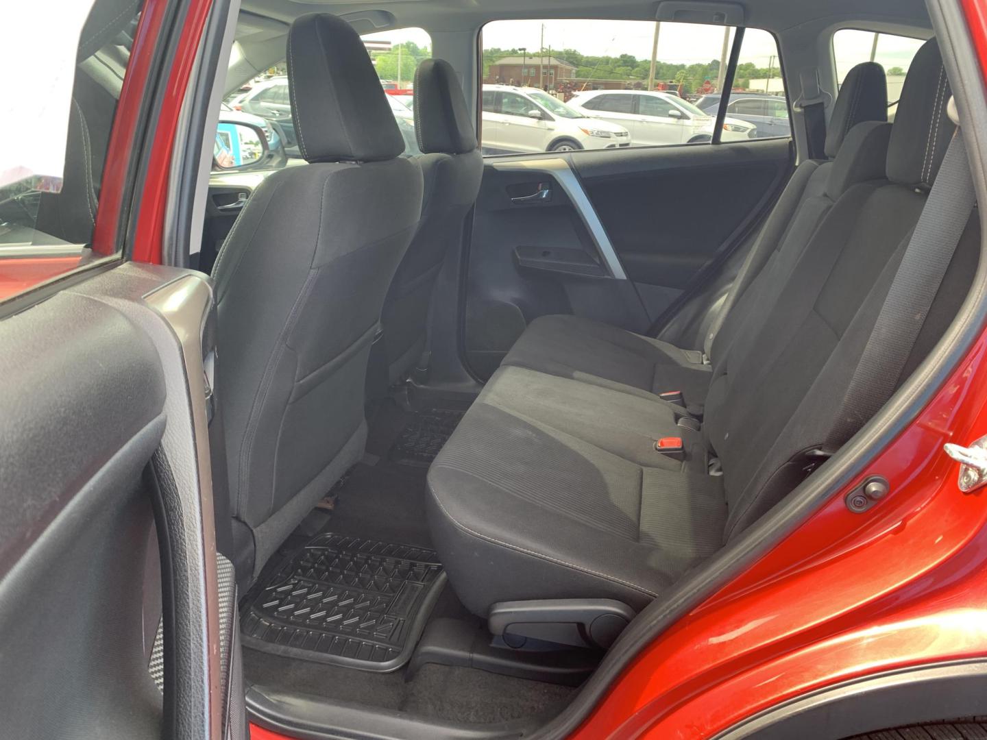 2015 RED /BLACK Toyota RAV4 XLE FWD (2T3WFREV0FW) with an 2.5L L4 DOHC 16V engine, Automatic transmission, located at 506 S. Kingshighway, Cape Girardeau, MO, 63703, (573) 235-5000, 37.294991, -89.553635 - 2015 Toyota RAV4 XLE 124,xxx miles Sunroof Backup Cam Bluetooth Front Wheel Drive Keyless Entry Power Windows/Locks/Mirrors We have financing available and we accept trades! Fill out a credit application on our website or come by today! If you have any questions, give us a call at (573) 2 - Photo#16