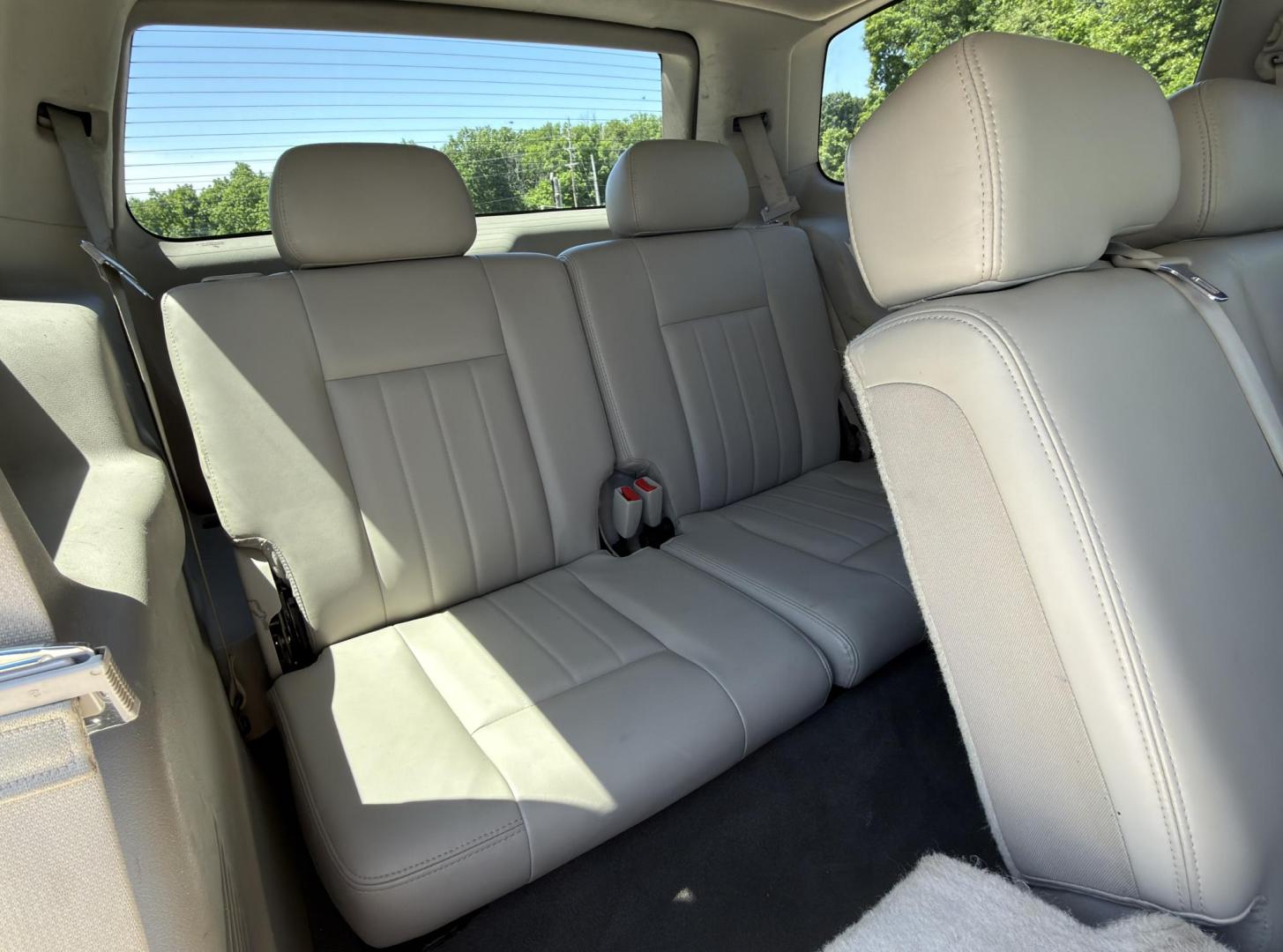 2005 WHITE /Gray Dodge Durango Limited 4WD (1D8HB58D55F) with an 5.7L V8 engine, Automatic transmission, located at 2990 Old Orchard Rd., Jackson, MO, 63755, 37.354214, -89.612106 - 2005 Dodge Durango Limited 196xxx miles 4 Wheel Drive 5.7L V8 HEMI Automatic Leather 3rd Row Rear Entertainment Navigation Power/Heated Seats Sunroof Cruise Power Windows/Locks/Mirrors We have financing available and we accept trades! Fill out a credit application on our website or come - Photo#21