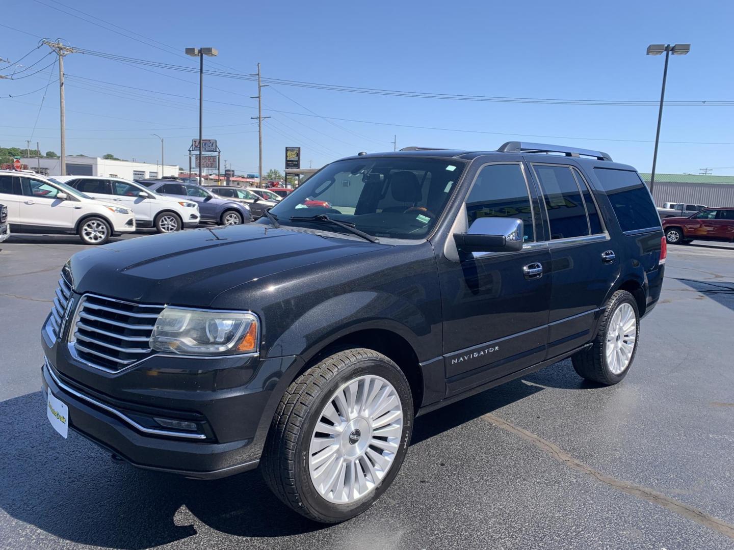 2015 BLACK /BLACK Lincoln Navigator 4WD (5LMJJ2JT8FE) with an 3.5L V6 DOHC 24V FFV engine, Automatic transmission, located at 506 S. Kingshighway, Cape Girardeau, MO, 63703, (573) 235-5000, 37.294991, -89.553635 - 2015 Lincoln Navigator 4WD 211,xxx miles Heated Seats Cooled Seats Power Tilt Wheel Bluetooth Sunroof 4 wheel drive Backup Camera 3rd. Row We have financing available and we accept trades! Fill out a credit application on our website or come by today! If you have any questions, give us a - Photo#3