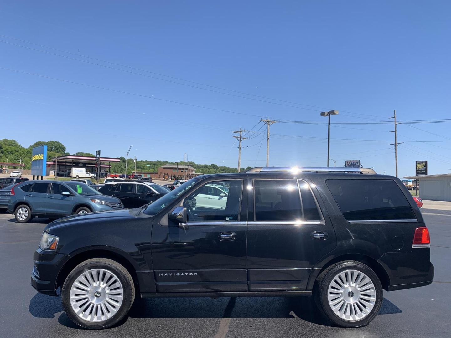 2015 BLACK /BLACK Lincoln Navigator 4WD (5LMJJ2JT8FE) with an 3.5L V6 DOHC 24V FFV engine, Automatic transmission, located at 506 S. Kingshighway, Cape Girardeau, MO, 63703, (573) 235-5000, 37.294991, -89.553635 - 2015 Lincoln Navigator 4WD 211,xxx miles Heated Seats Cooled Seats Power Tilt Wheel Bluetooth Sunroof 4 wheel drive Backup Camera 3rd. Row We have financing available and we accept trades! Fill out a credit application on our website or come by today! If you have any questions, give us a - Photo#4