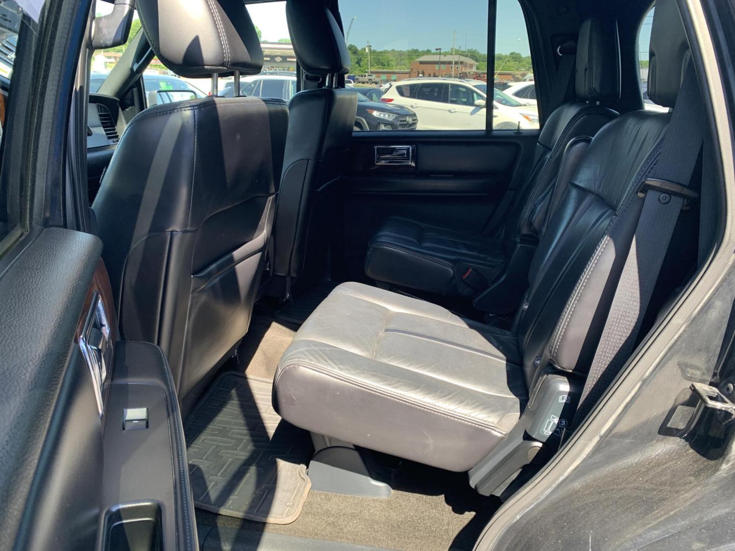 2015 BLACK /BLACK Lincoln Navigator 4WD (5LMJJ2JT8FE) with an 3.5L V6 DOHC 24V FFV engine, Automatic transmission, located at 506 S. Kingshighway, Cape Girardeau, MO, 63703, (573) 235-5000, 37.294991, -89.553635 - 2015 Lincoln Navigator 4WD 211,xxx miles Heated Seats Cooled Seats Power Tilt Wheel Bluetooth Sunroof 4 wheel drive Backup Camera 3rd. Row We have financing available and we accept trades! Fill out a credit application on our website or come by today! If you have any questions, give us a - Photo#20