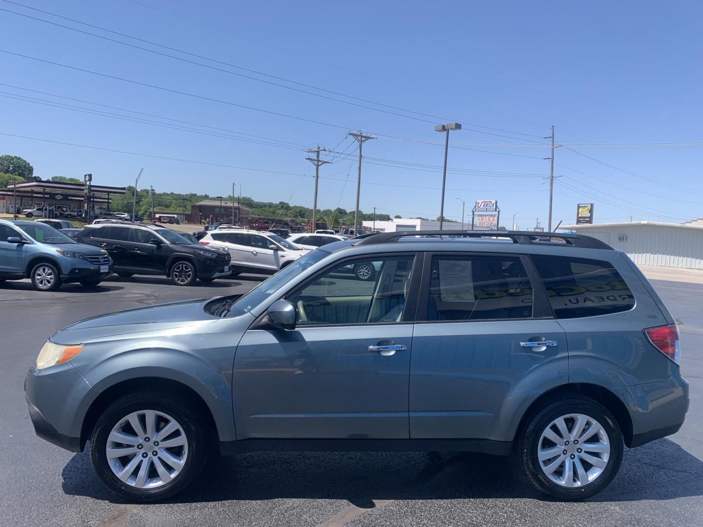 2011 BLUE /GRAY Subaru Forester 2.5X Premium (JF2SHBDC4BH) with an 2.5L H4 SOHC 16V engine, Automatic transmission, located at 506 S. Kingshighway, Cape Girardeau, MO, 63703, (573) 235-5000, 37.294991, -89.553635 - 2011 Subaru Forester 2.5X Premium Only 77,xxx miles AWD Sunroof Power Seat Cruise Heated Seats We have financing available and we accept trades! Fill out a credit application on our website or come by today! If you have any questions, give us a call at (573) 235-5000 or visit our website at - Photo#4