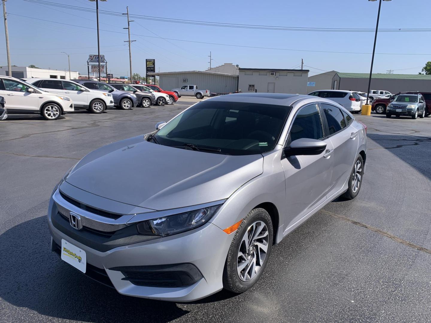 2018 SILVER /GRAY Honda Civic EX Sedan (19XFC2F72JE) with an 2.0L L4 DOHC 16V engine, Automatic transmission, located at 506 S. Kingshighway, Cape Girardeau, MO, 63703, (573) 235-5000, 37.294991, -89.553635 - Alarm System Bluetooth Cloth Seats Cruise Control Power Outlet Power Windows/Locks/Mirrors Keyless Entry Push-Button Engine Start Rear Window Defroster Remote Engine Start Steering Wheel Controls Tilt Steering Wheel USB Port We have financing available and we accept trades! Fill out a - Photo#3