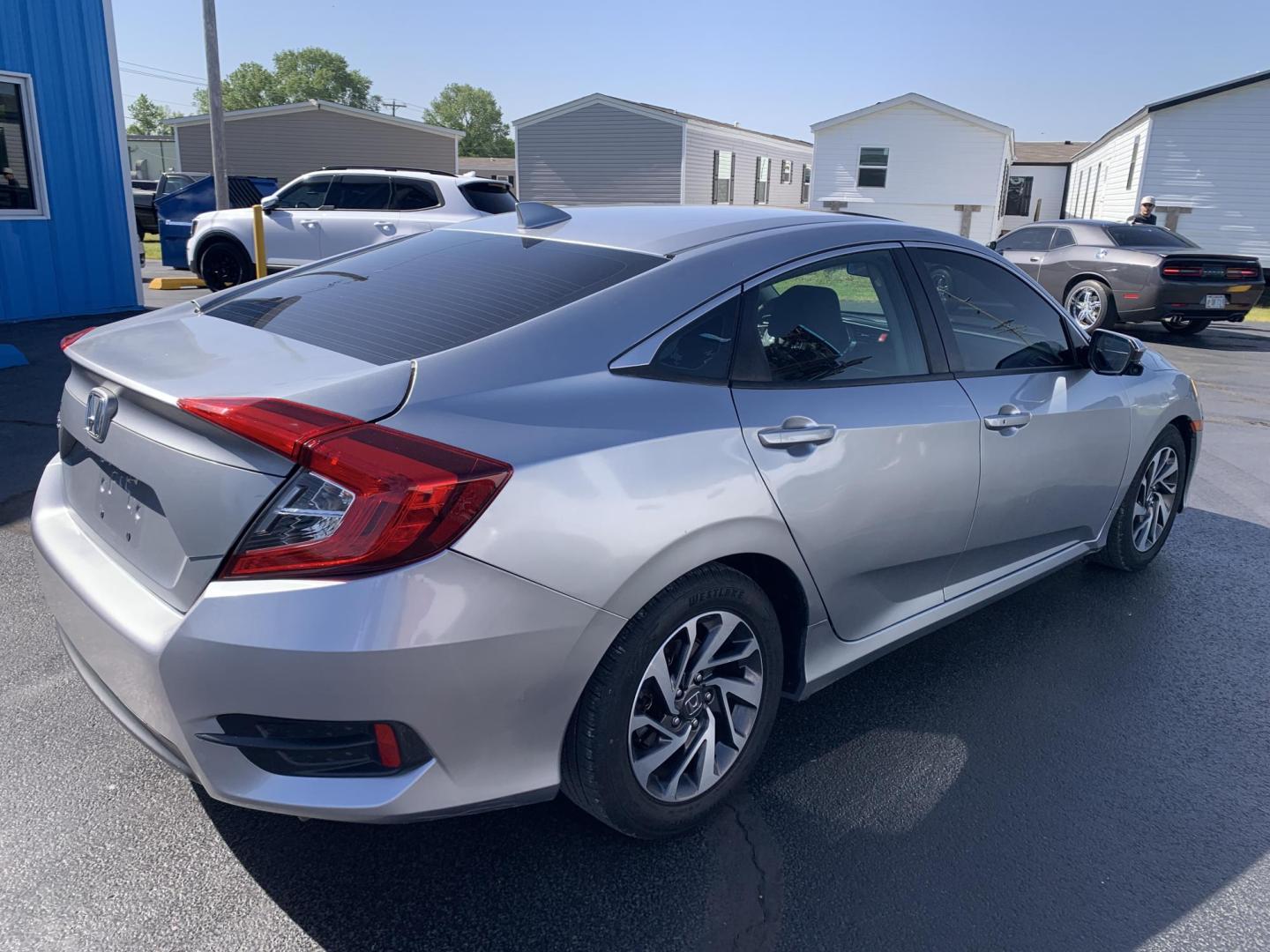 2018 SILVER /GRAY Honda Civic EX Sedan (19XFC2F72JE) with an 2.0L L4 DOHC 16V engine, Automatic transmission, located at 506 S. Kingshighway, Cape Girardeau, MO, 63703, (573) 235-5000, 37.294991, -89.553635 - Alarm System Bluetooth Cloth Seats Cruise Control Power Outlet Power Windows/Locks/Mirrors Keyless Entry Push-Button Engine Start Rear Window Defroster Remote Engine Start Steering Wheel Controls Tilt Steering Wheel USB Port We have financing available and we accept trades! Fill out a - Photo#9