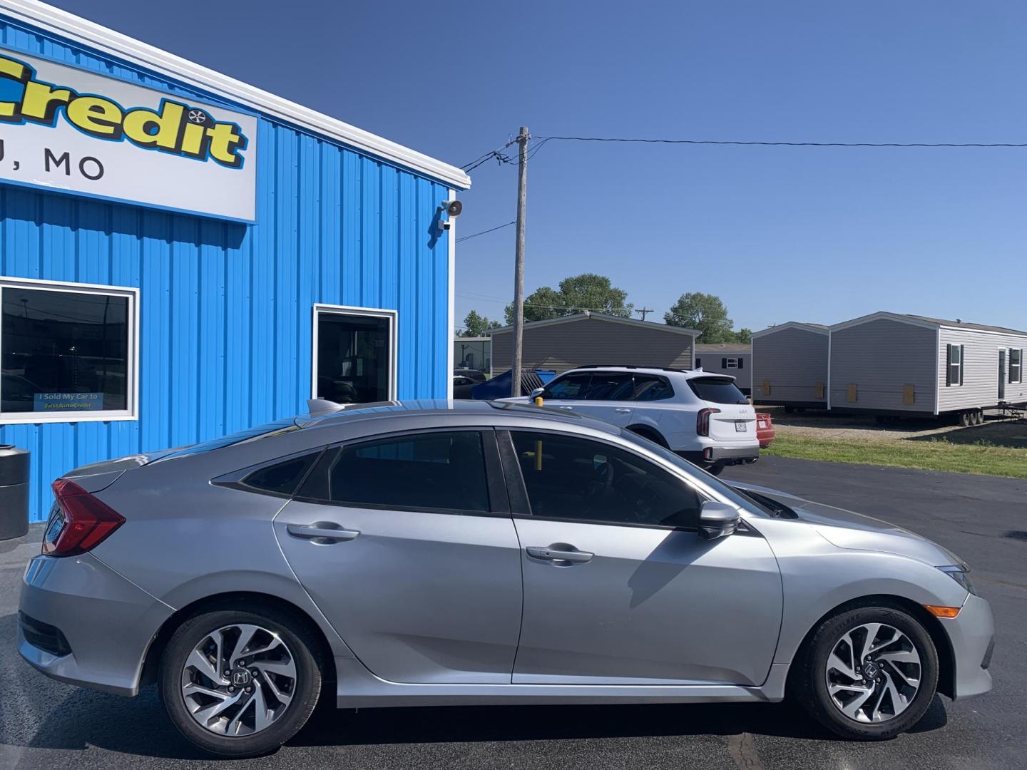 2018 SILVER /GRAY Honda Civic EX Sedan (19XFC2F72JE) with an 2.0L L4 DOHC 16V engine, Automatic transmission, located at 506 S. Kingshighway, Cape Girardeau, MO, 63703, (573) 235-5000, 37.294991, -89.553635 - Alarm System Bluetooth Cloth Seats Cruise Control Power Outlet Power Windows/Locks/Mirrors Keyless Entry Push-Button Engine Start Rear Window Defroster Remote Engine Start Steering Wheel Controls Tilt Steering Wheel USB Port We have financing available and we accept trades! Fill out a - Photo#10