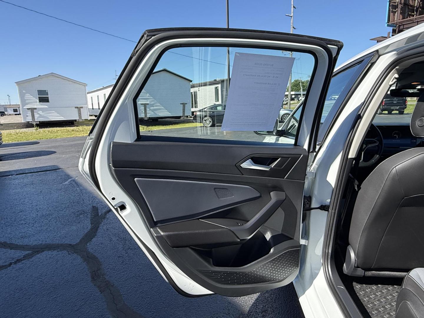 2025 WHITE /Black Volkswagen Jetta SE (3VW7X7BU9SM) with an 1.5L L4 DOHC 16V engine, Automatic transmission, located at 506 S. Kingshighway, Cape Girardeau, MO, 63703, (573) 235-5000, 37.294991, -89.553635 - 2025 Volkswagen Jetta SE 65xxx miles Front Wheel Drive 1.5L 4 Cyl Automatic Leather Backup Camera Power Driver Seat Heated Seats Sunroof Bluetooth Remote Start Cruise Power Windows/Locks/Mirrors We have financing available and we accept trades! Fill out a credit application on our webs - Photo#14