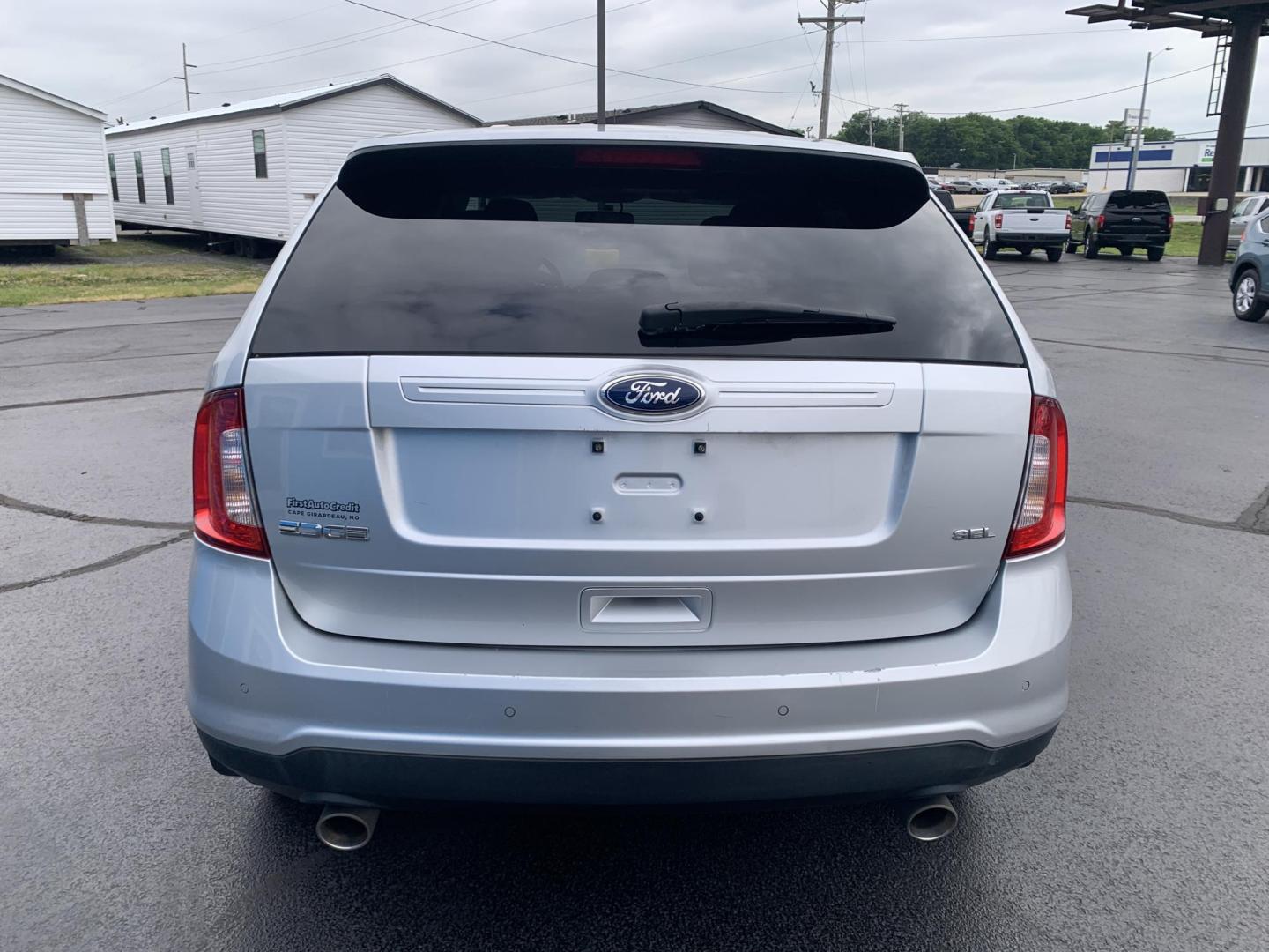 2014 SILVER /TAN Ford Edge SEL FWD (2FMDK3JCXEB) with an 3.5L V6 DOHC 24V engine, Automatic transmission, located at 506 S. Kingshighway, Cape Girardeau, MO, 63703, (573) 235-5000, 37.294991, -89.553635 - 2014 Ford Edge SEL FWD 121,xxx miles Bluetooth Front Wheel Drive Cruise Power Windows/Locks/Mirrors We have financing available and we accept trades! Fill out a credit application on our website or come by today! If you have any questions, give us a call at (573) 235-5000 or visit our website - Photo#6