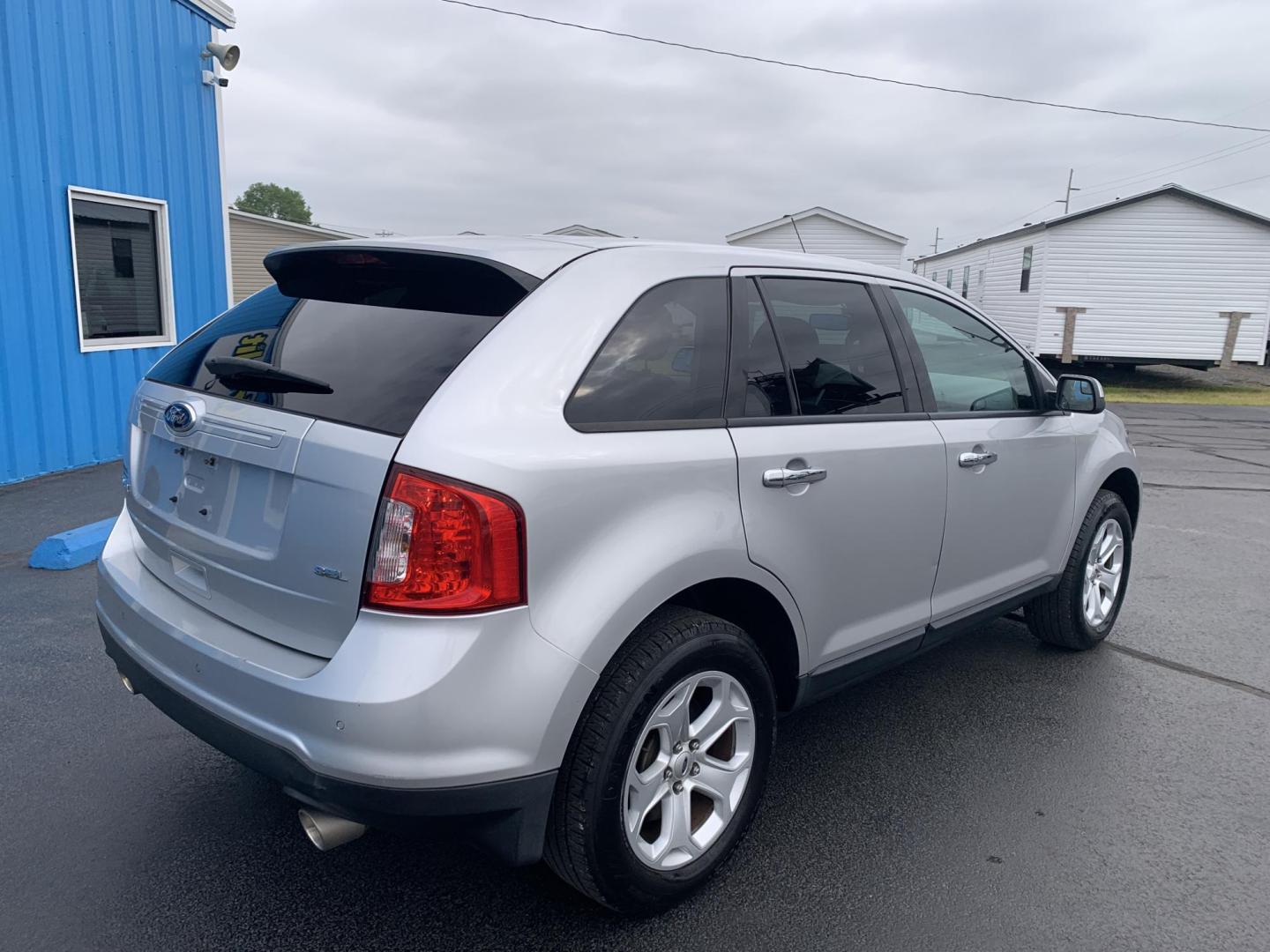 2014 SILVER /TAN Ford Edge SEL FWD (2FMDK3JCXEB) with an 3.5L V6 DOHC 24V engine, Automatic transmission, located at 506 S. Kingshighway, Cape Girardeau, MO, 63703, (573) 235-5000, 37.294991, -89.553635 - 2014 Ford Edge SEL FWD 121,xxx miles Bluetooth Front Wheel Drive Cruise Power Windows/Locks/Mirrors We have financing available and we accept trades! Fill out a credit application on our website or come by today! If you have any questions, give us a call at (573) 235-5000 or visit our website - Photo#9
