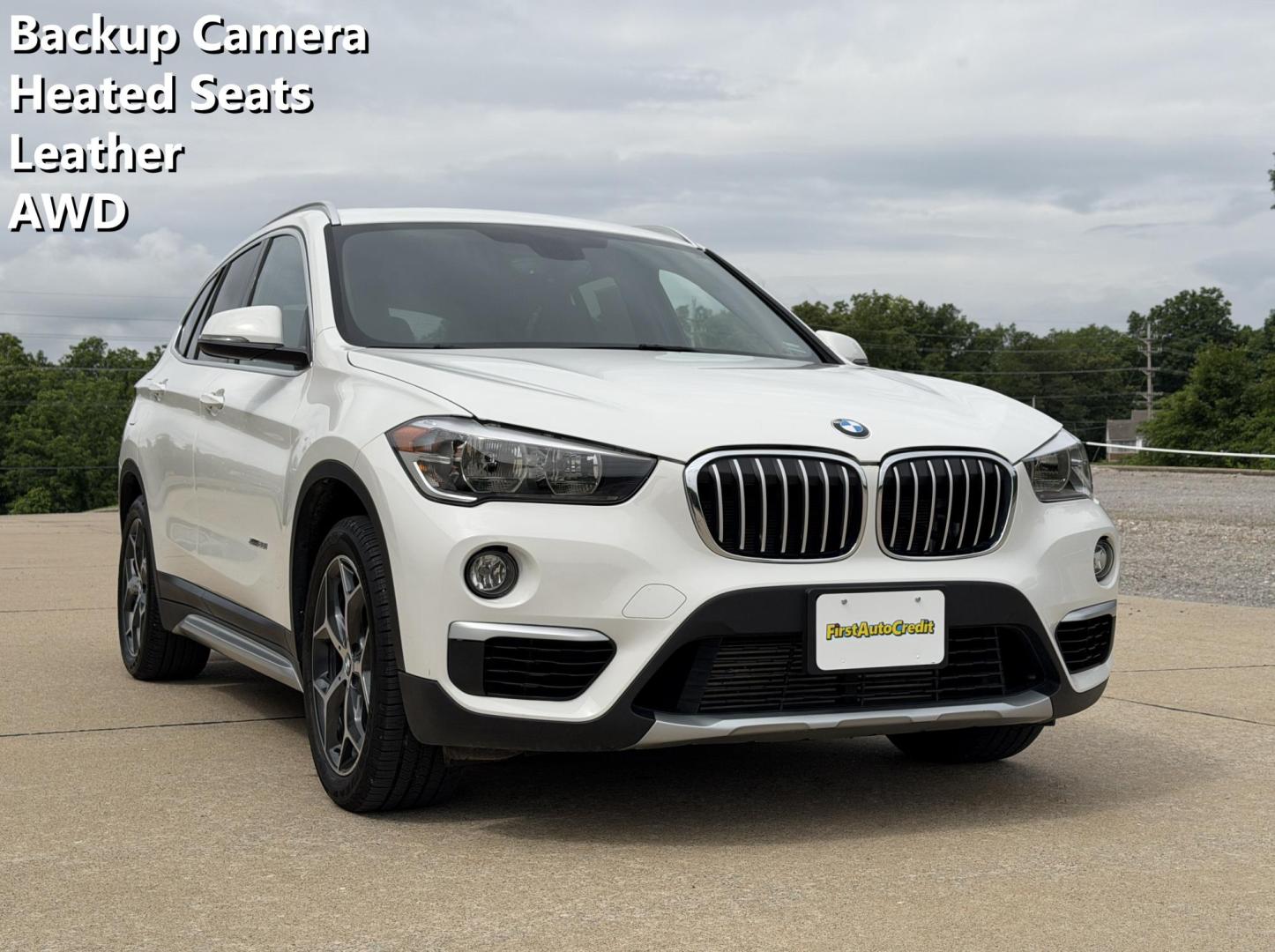 2018 WHITE /Black BMW X1 xDrive28i (WBXHT3C3XJ5) with an 2.0L 4 Cyl. engine, Automatic transmission, located at 2990 Old Orchard Rd., Jackson, MO, 63755, 37.354214, -89.612106 - 2018 BMW X1 xDrive28i 66xxx miles All Wheel Drive 2.0L 4 Cyl. Automatic Leather Backup Camera Power/Heated Seats Heated Steering Wheel Sunroof Bluetooth Cruise Power Windows/Locks/Mirrors We have financing available and we accept trades! Fill out a credit application on our website or - Photo#0
