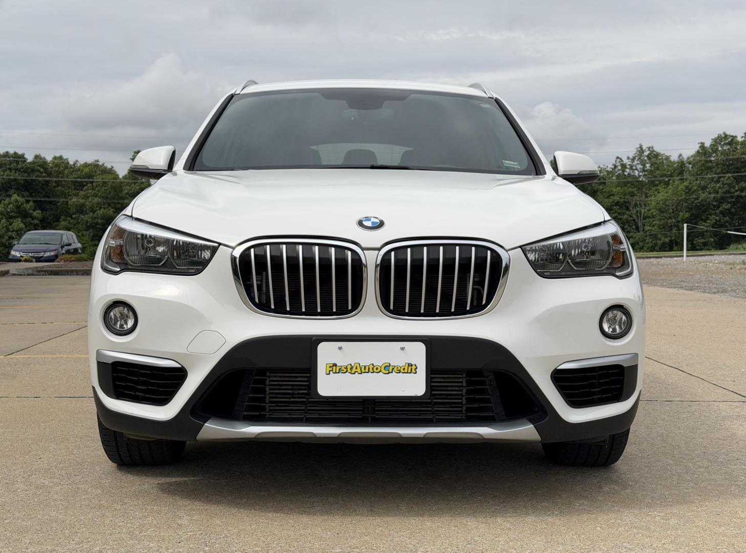 2018 WHITE /Black BMW X1 xDrive28i (WBXHT3C3XJ5) with an 2.0L 4 Cyl. engine, Automatic transmission, located at 2990 Old Orchard Rd., Jackson, MO, 63755, 37.354214, -89.612106 - 2018 BMW X1 xDrive28i 66xxx miles All Wheel Drive 2.0L 4 Cyl. Automatic Leather Backup Camera Power/Heated Seats Heated Steering Wheel Sunroof Bluetooth Cruise Power Windows/Locks/Mirrors We have financing available and we accept trades! Fill out a credit application on our website or - Photo#13