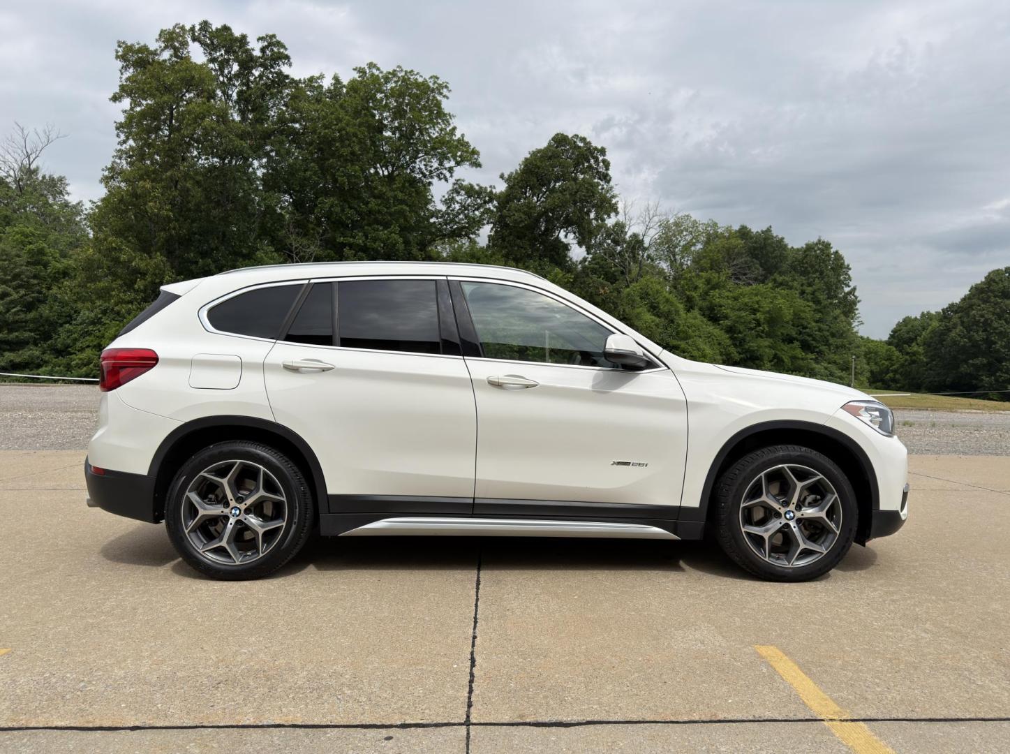 2018 WHITE /Black BMW X1 xDrive28i (WBXHT3C3XJ5) with an 2.0L 4 Cyl. engine, Automatic transmission, located at 2990 Old Orchard Rd., Jackson, MO, 63755, 37.354214, -89.612106 - 2018 BMW X1 xDrive28i 66xxx miles All Wheel Drive 2.0L 4 Cyl. Automatic Leather Backup Camera Power/Heated Seats Heated Steering Wheel Sunroof Bluetooth Cruise Power Windows/Locks/Mirrors We have financing available and we accept trades! Fill out a credit application on our website or - Photo#9