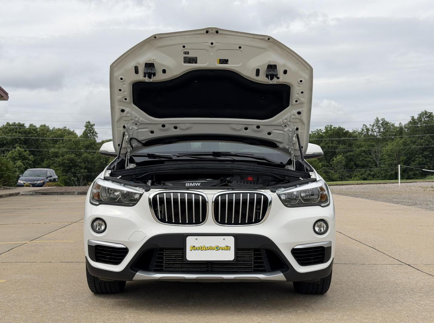 2018 WHITE /Black BMW X1 xDrive28i (WBXHT3C3XJ5) with an 2.0L 4 Cyl. engine, Automatic transmission, located at 2990 Old Orchard Rd., Jackson, MO, 63755, 37.354214, -89.612106 - 2018 BMW X1 xDrive28i 66xxx miles All Wheel Drive 2.0L 4 Cyl. Automatic Leather Backup Camera Power/Heated Seats Heated Steering Wheel Sunroof Bluetooth Cruise Power Windows/Locks/Mirrors We have financing available and we accept trades! Fill out a credit application on our website or - Photo#36