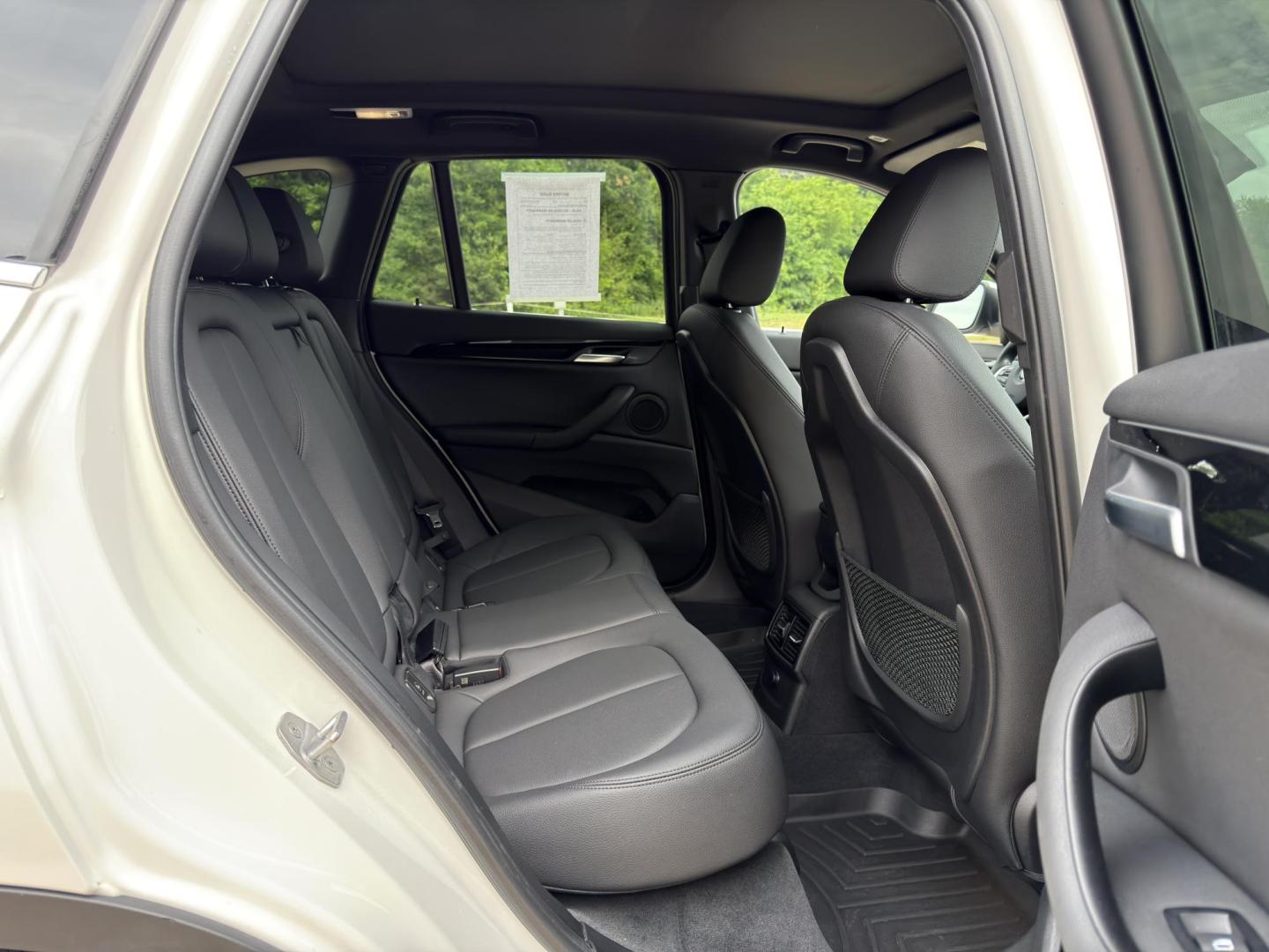 2018 WHITE /Black BMW X1 xDrive28i (WBXHT3C3XJ5) with an 2.0L 4 Cyl. engine, Automatic transmission, located at 2990 Old Orchard Rd., Jackson, MO, 63755, 37.354214, -89.612106 - 2018 BMW X1 xDrive28i 66xxx miles All Wheel Drive 2.0L 4 Cyl. Automatic Leather Backup Camera Power/Heated Seats Heated Steering Wheel Sunroof Bluetooth Cruise Power Windows/Locks/Mirrors We have financing available and we accept trades! Fill out a credit application on our website or - Photo#19