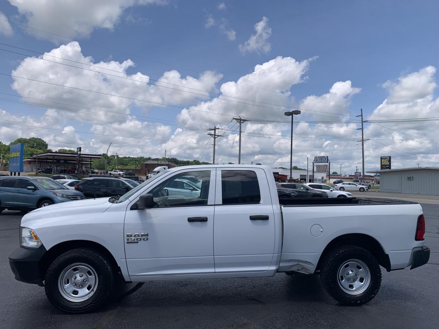 2021 WHITE /GRAY RAM 1500 Classic Tradesman Quad Cab 2WD (1C6RR6FG9MS) with an 3.6L V6 DOHC 24V FFV engine, Automatic transmission, located at 506 S. Kingshighway, Cape Girardeau, MO, 63703, (573) 235-5000, 37.294991, -89.553635 - 2021 RAM 1500 Classic Tradesman Quad Cab 2WD 137,xxx miles One Owner Bluetooth Backup Camera Rear wheel drive Power windows/locks/mirrors We have financing available and we accept trades! Fill out a credit application on our website or come by today! If you have any questions, give us a call - Photo#4